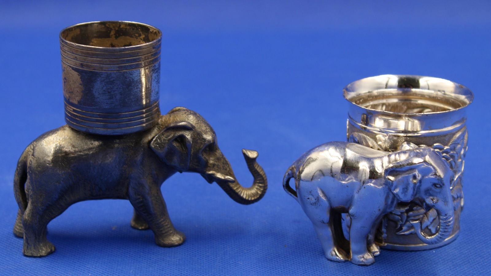 Pr. Victorian Silverplate Elephant Toothpick Holders: Pair of Victorian Elephant figural silverplate toothpick holders. One signed "Tufts." Measure 2 1/2" H.