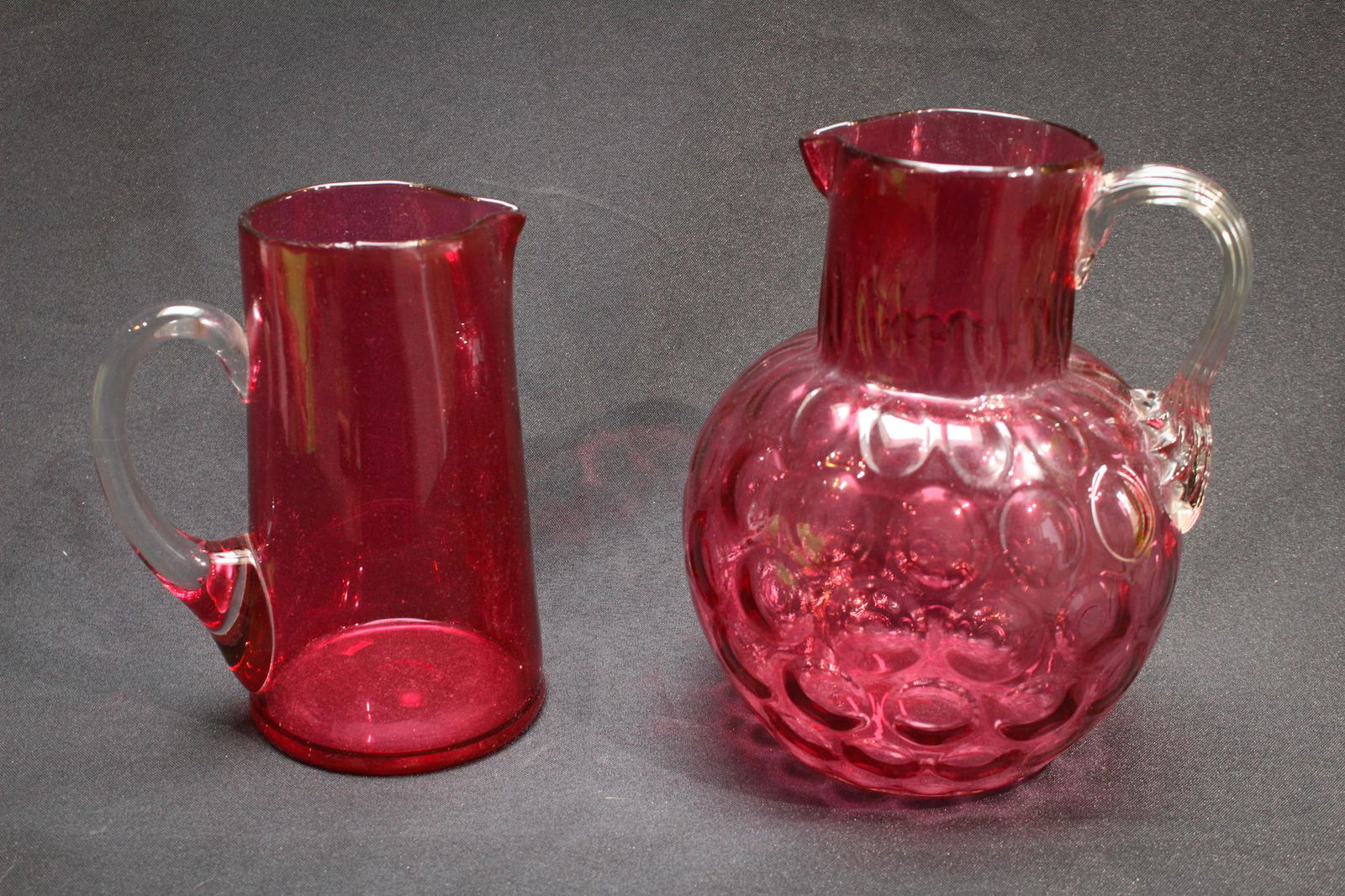 Lot of 2 Victorian Cranberry Art Glass Water Pitchers (1 of 4)