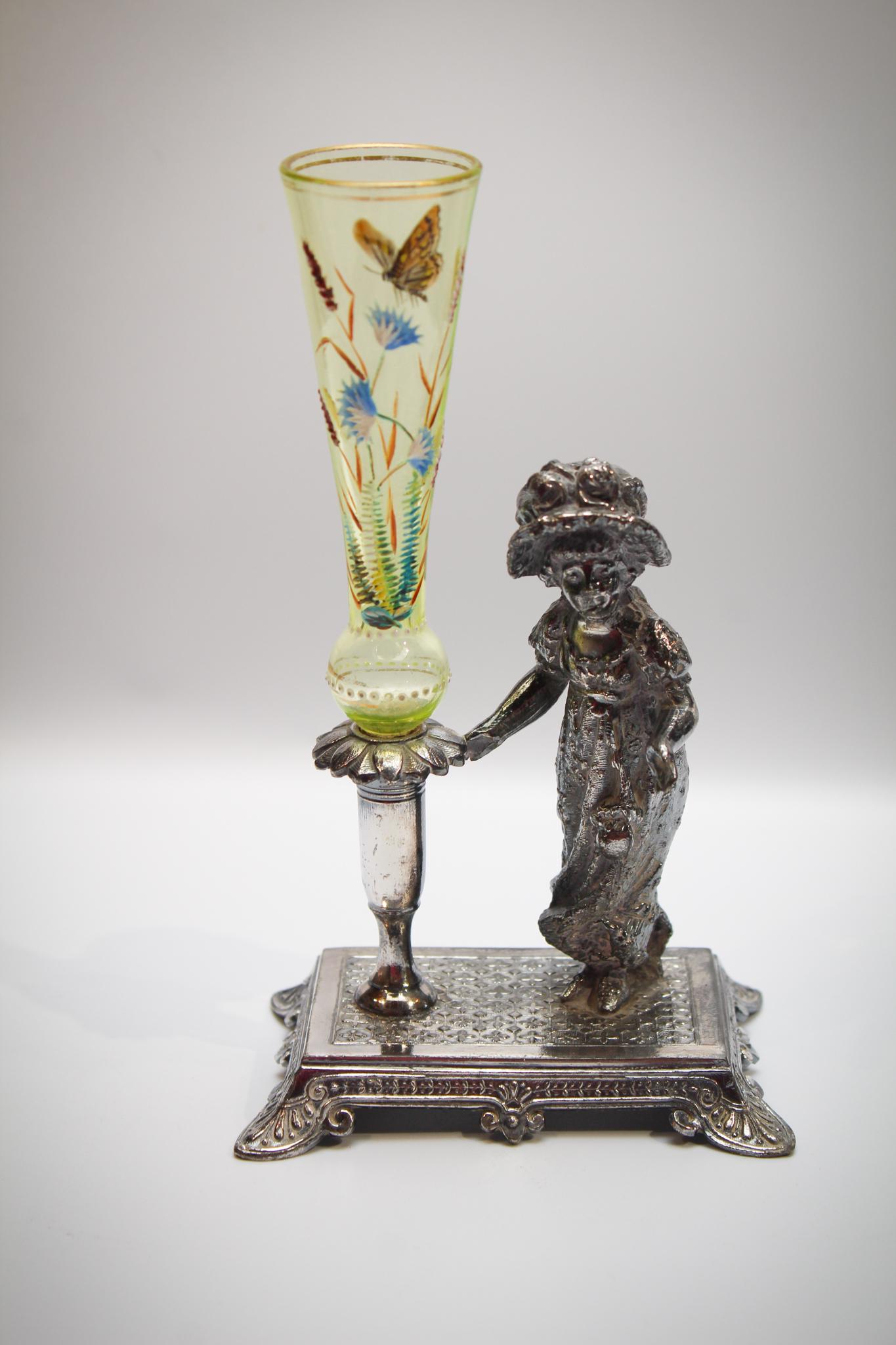Rare Tufts Silverplate Vaseline Kate Greenaway Vase: An incredible signed Tufts Silverplate figural kate Greenaway silverplate holder with Vaseline enameled Bud Vase. Wow! Piece is beautiful. Delicate decoration and so sweet. Measures: 6 3/4" tall, 4" w