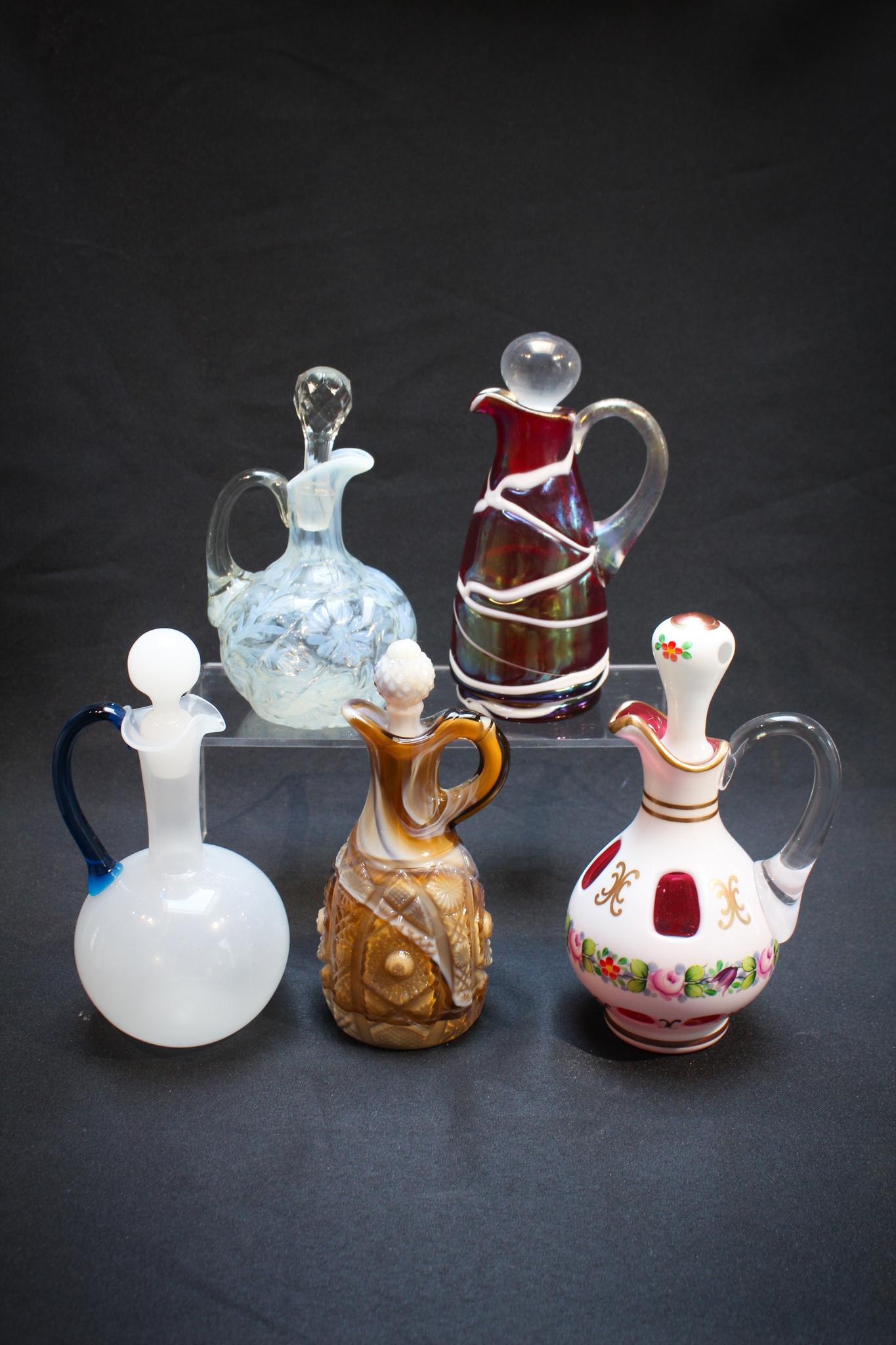 Lot of 5 Cruets: A super assorted lot of cruets to include Victorian Bohemian, Austrian, Gibson and other makers. Nice grouping. All for one money! Tallest measures: 7 1/2" tall, 4" wide. Condition: Excellent