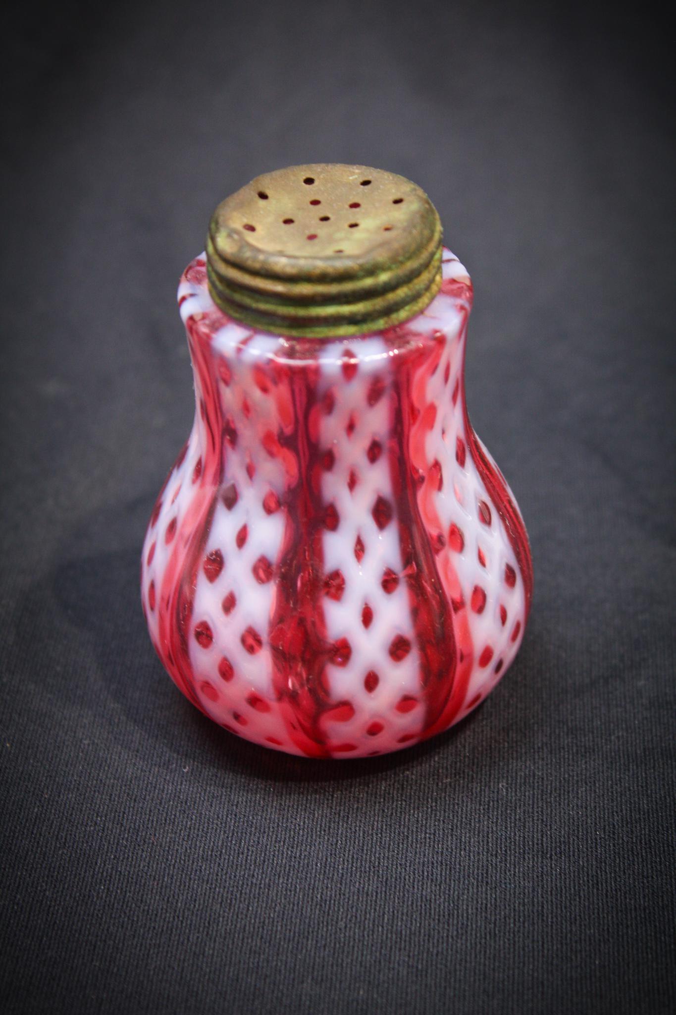 Cranberry Opalescent Consolidated Salt Shaker: This is a staple for any salt shaker collection. Nice color and strong opalescence. Measures 3 1/4" tall.
