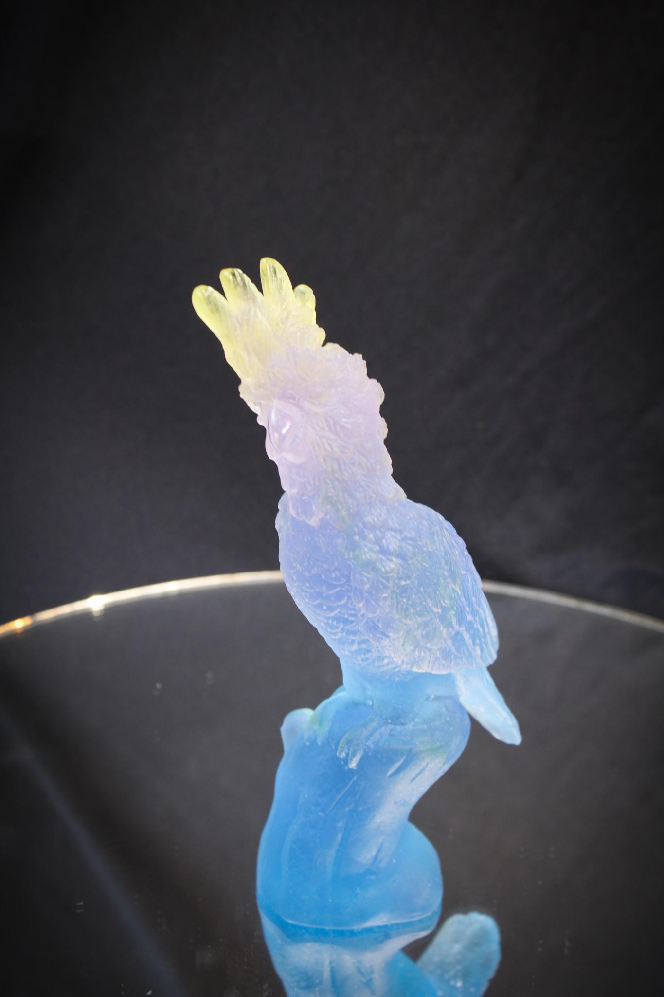 Daum France Pate de Verre Cockatoo figure: For all you bird lovers out there, we offer this signed Daum Pate de Verre Cockatoo. Colorful and ready to perch itself on your shelf. Measures 6" tall.