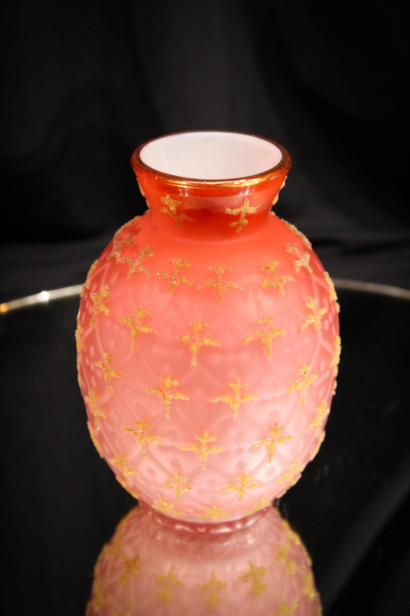 Coralene Mother of Pearl Apricot Vase: So sparkly! Coralene decorated mother of pearl vase in the maltese cross pattern very pretty pinky apricot coloring. Measures 5" tall.