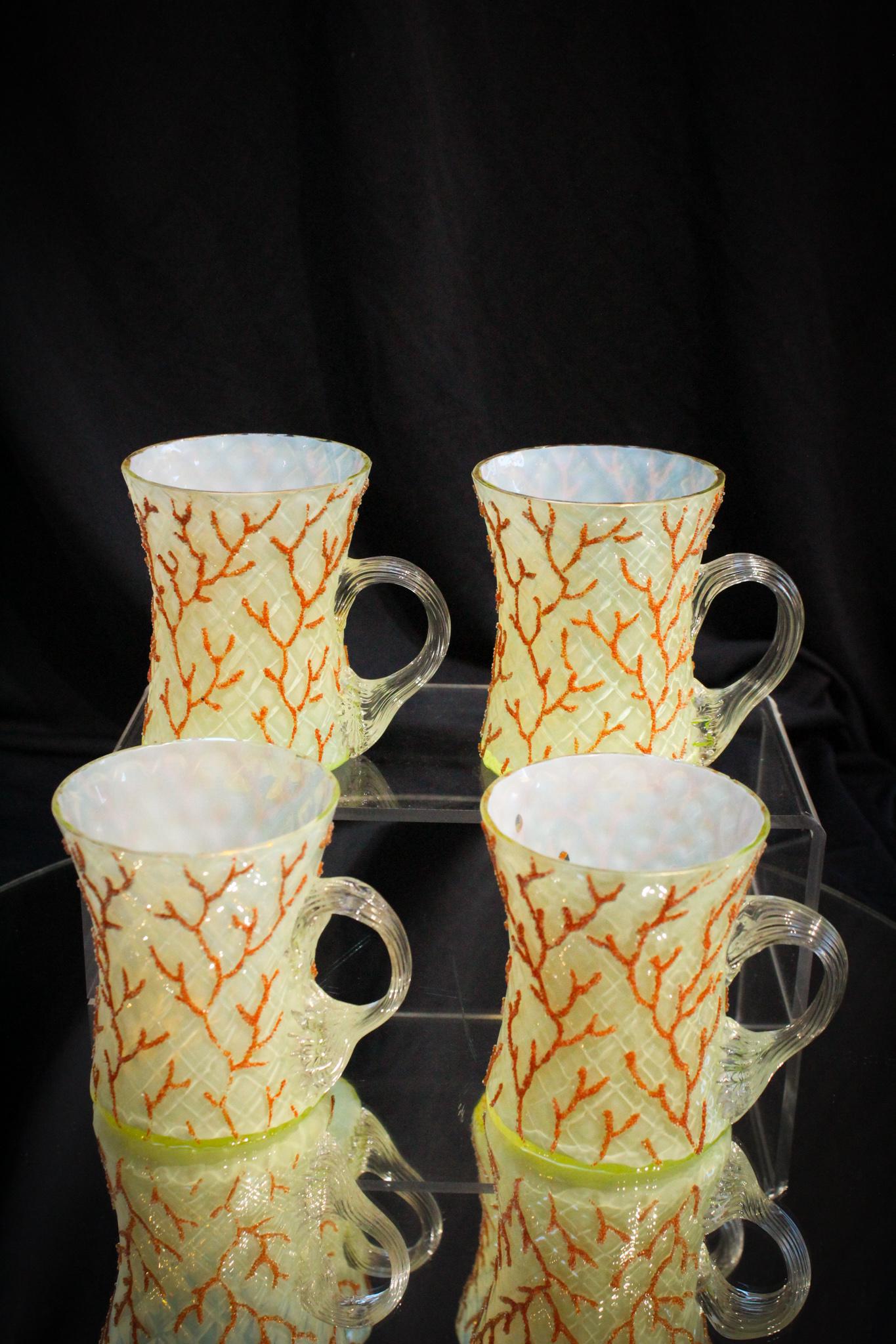 4 pc Lot Vaseline Coralene Cut Velvet Cups: These are so unusal. They are cased Vased glass cut velvet pattern with applied coralene dÃ©cor and applied clear handles. Nice corset shape. Each measures 3 1/2" tall.