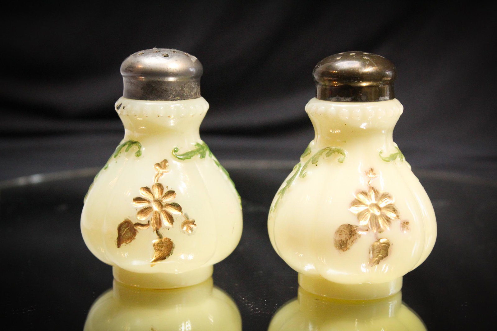 Pr Northwood Custard glass Intaglio Shakers: How often do you find these. If you answered often, you are correct! But these are Very nice examples with good gold and decoration. Each measures 3 1/4" tall