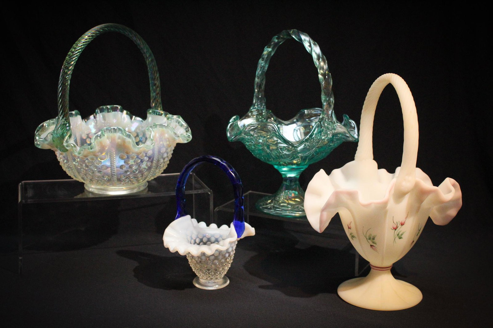 Lot of 4 Fenton Glass Baskets: Lot of 4 Fenton Baskets to include Hobnail, Carnival and hand painted. Tallest measures 10" high.