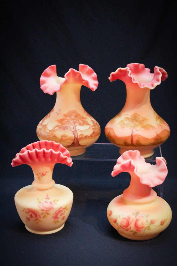 Lot 4 pieces Fenton Burmese Glass: Lot of 2 pieces of Fenton Burmese glass two include two examples with scenic deccor and two examples with roses. Tallest measures 7" tall.