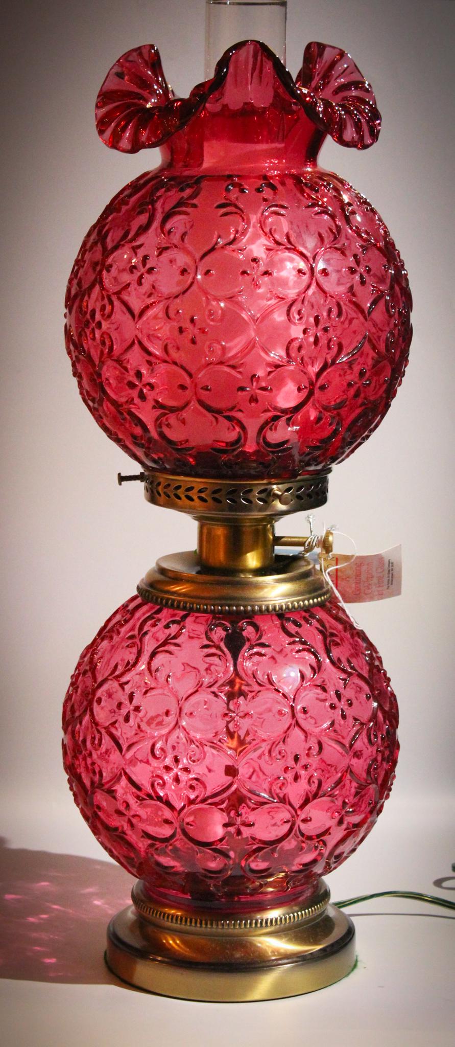Fenton Cranberry Spanish Lace GWTW lamp: Rich cranberry Spanish Lace pattern Fenton Gone with the Wind Lamp. Lamp measures 23" tall.