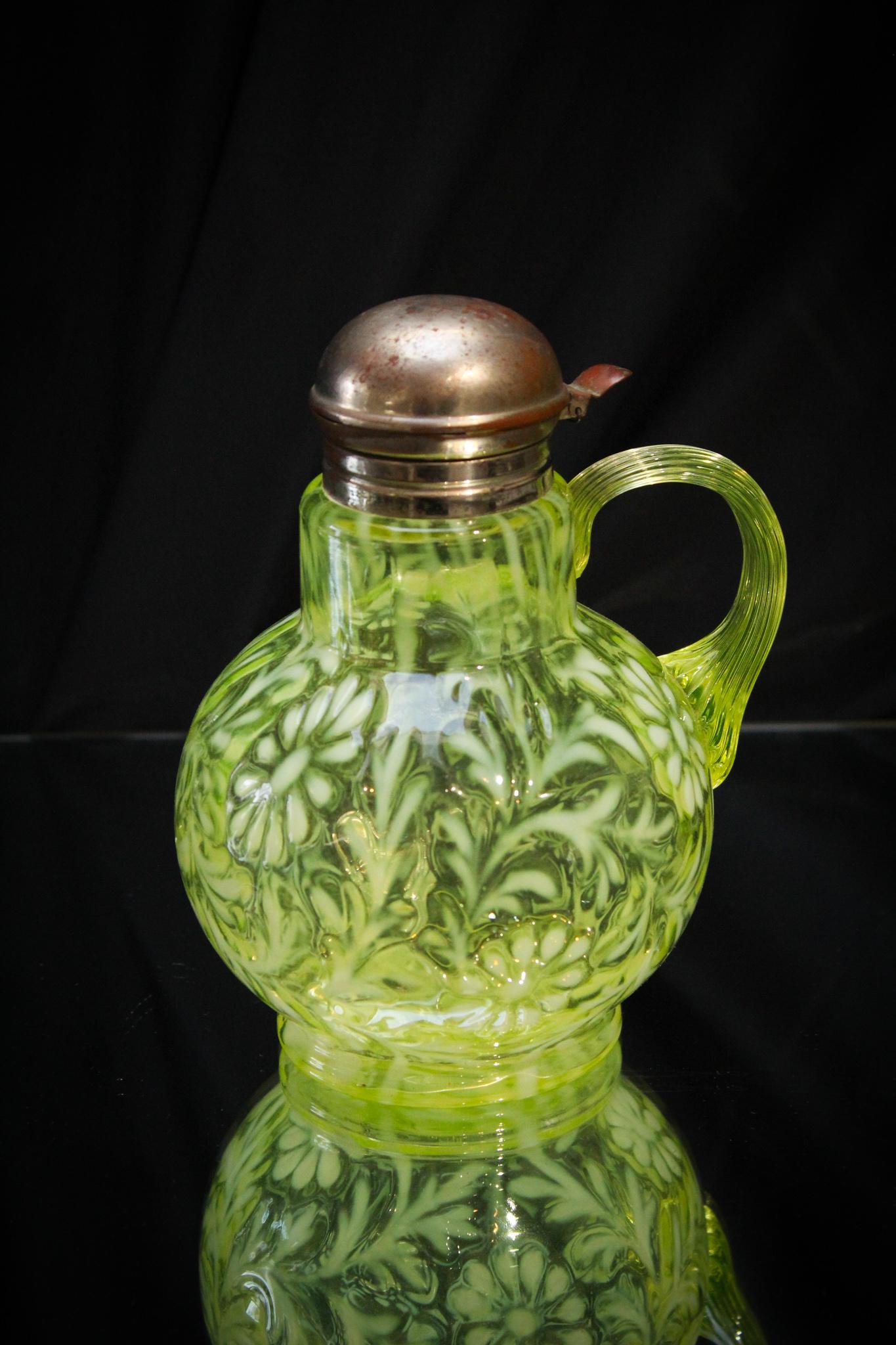 Fenton Glass L G Wright Topaz Opalescent Syrup: This is vivid in color. Fenton Topaz opalescent daisy and fern pattern syrup pitcher. Nice opal on this example and glows vividly under black light! Measures 6 1/4" tall.
