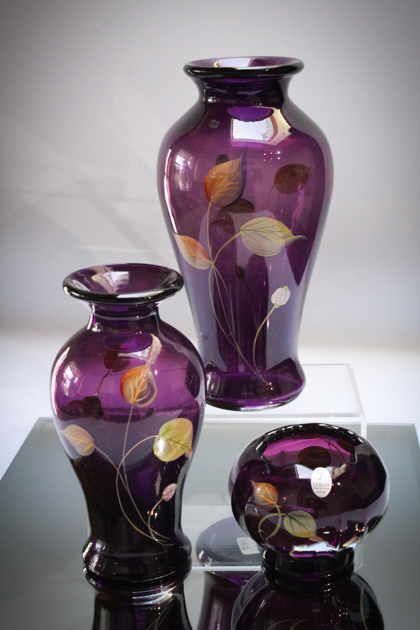 3 pc Lot Fenton Royal Purple Hand Painted Glass: This is one of our favority colors. Fenton Royal Purple glass and how much better could it be than these hand painted examples? Tallest measures 12" tall.