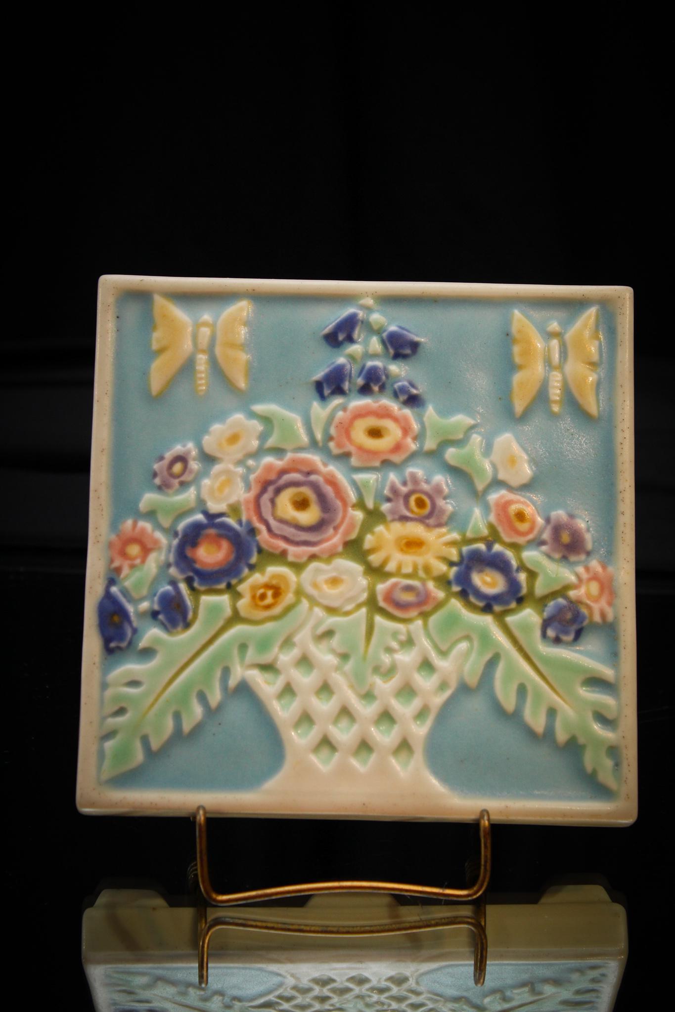 Rookwood Pottery Butterfly & Florals Tile: Nice signed Rookwood floral and butterfly pottery tile. Measures 5 3/4" square.