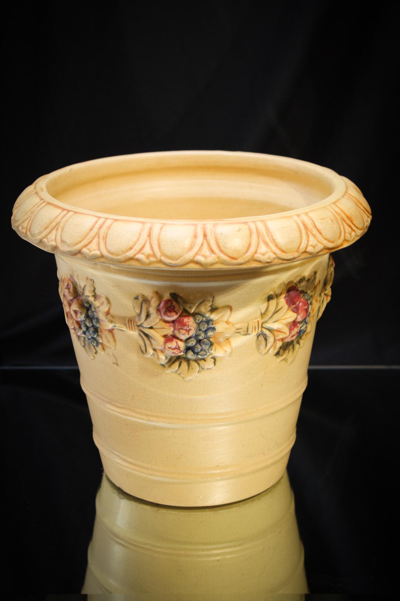 Weller pottery Ivory Line Flower Pot: Weller pottery Ivory Line flower pot with berry and floral dÃ©cor. Nice size. Measures 7 1/2" tall.