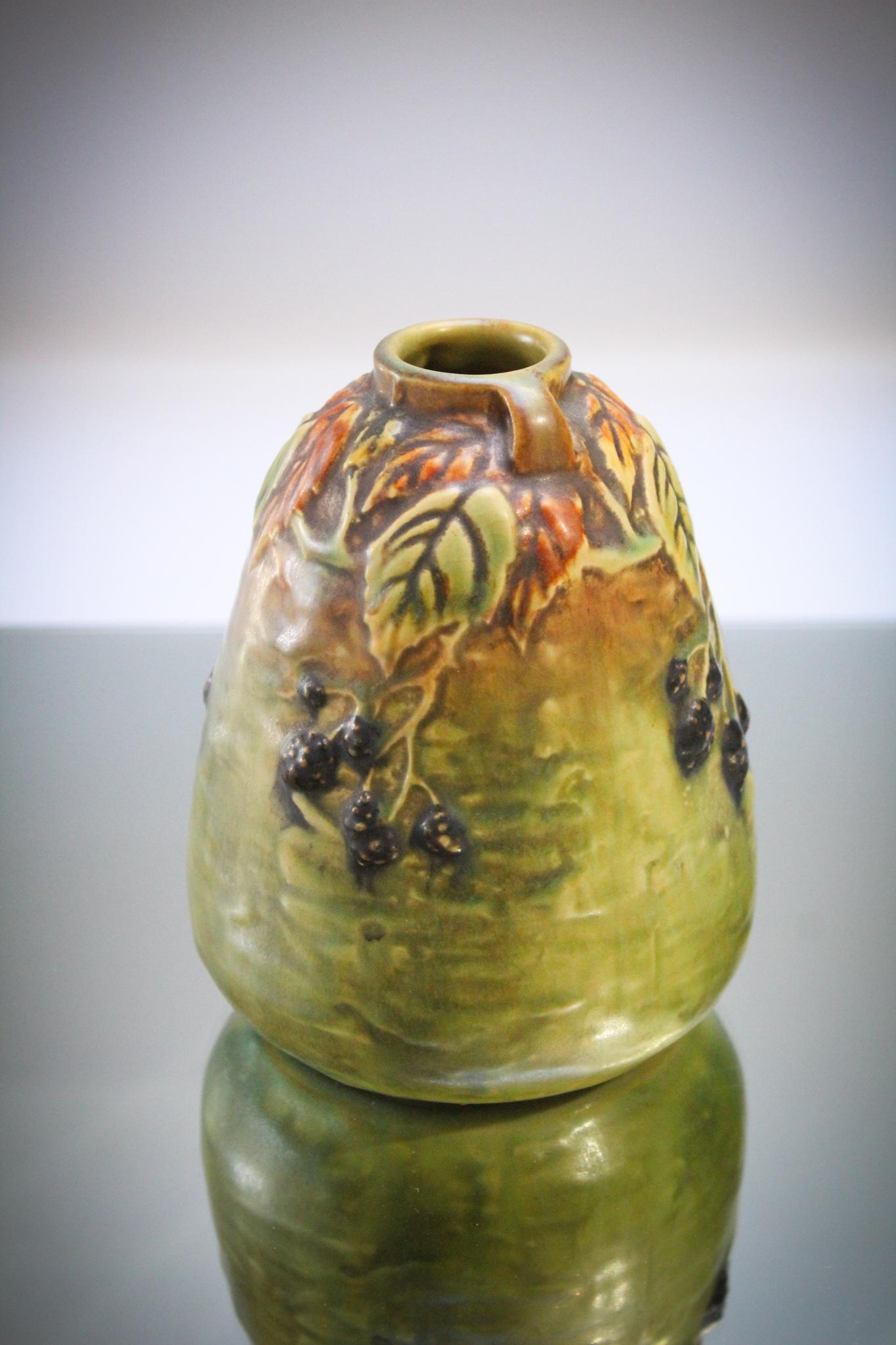 Roseville Pottery Blackberry Vase: Roseville pottery signed Blackberry dÃ©cor vase. Measures 5 1/4" tall.