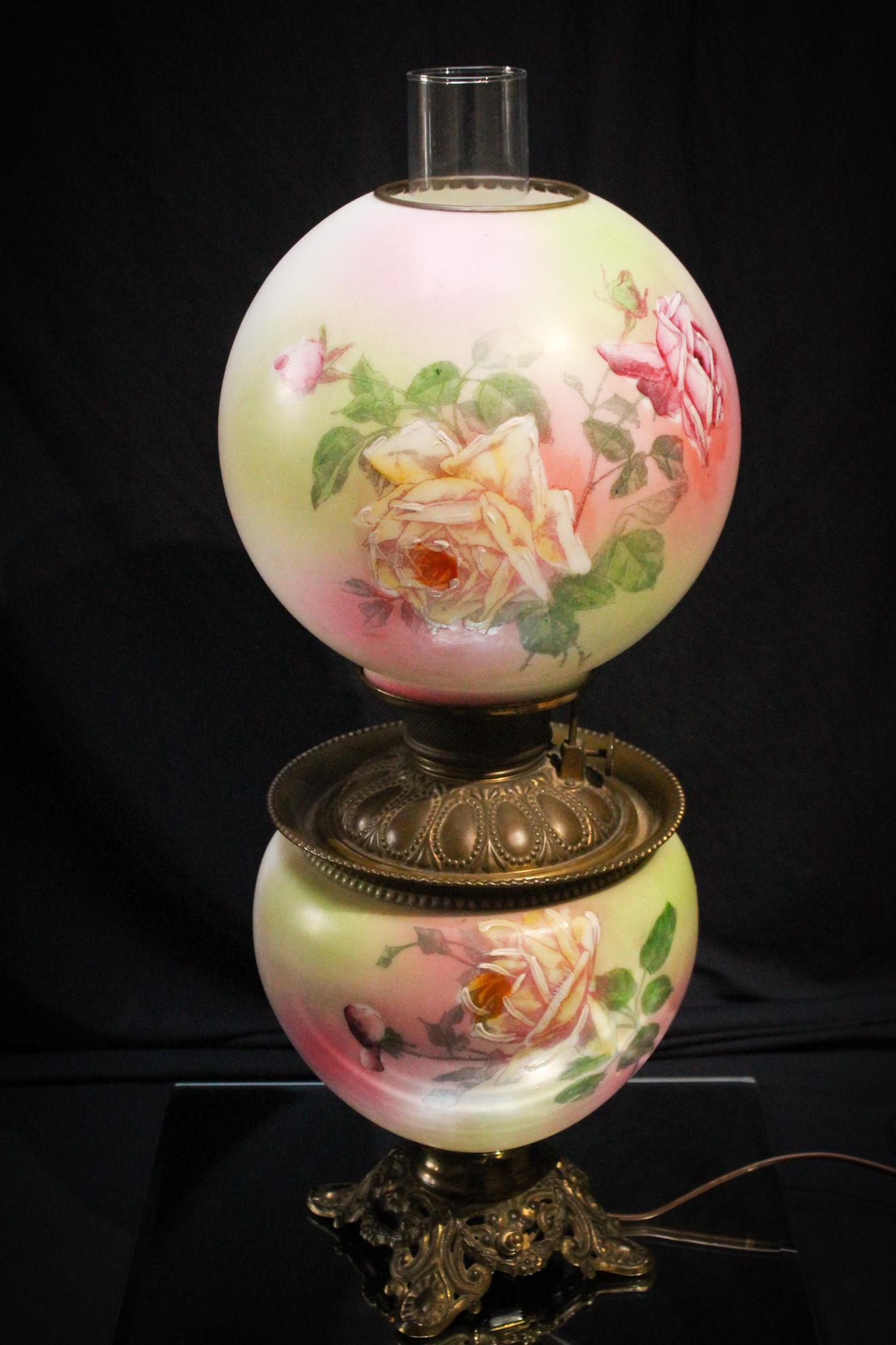 Victorian Gone With the Wind Rose Lamp: So truly Victorian is this antique gone with the wind oil converted to electric lamp with pastel pink and yellow colors and full blown roses. Lamp measures 20 1/4" tall.