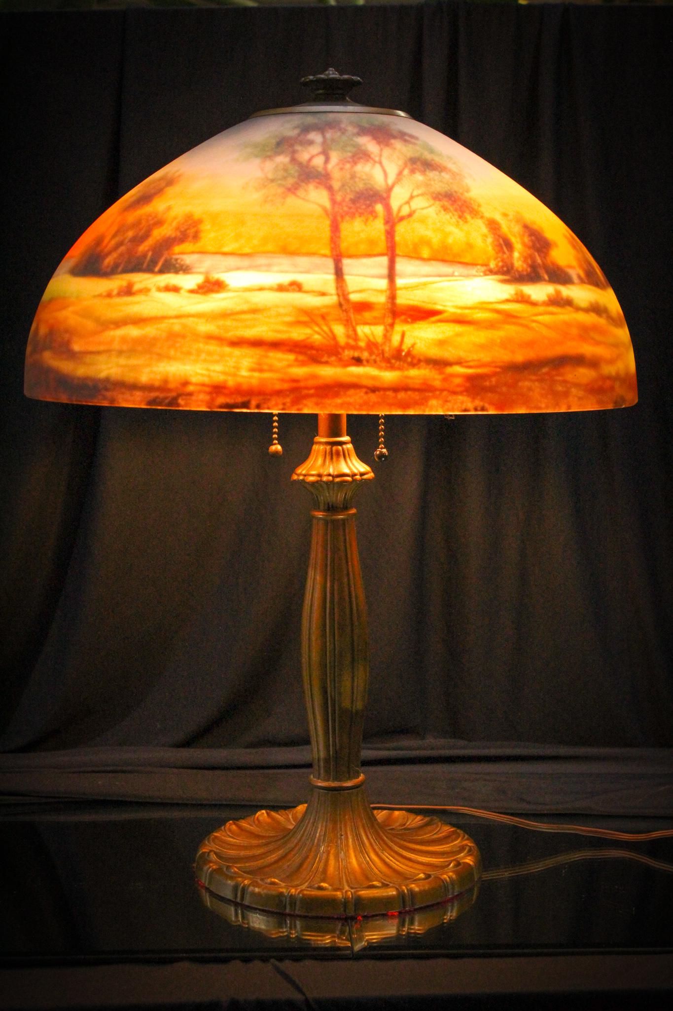 Fine Antique Jefferson Reverse Painted Table Lamp: This is a nice example isn't it? Look at the colors of the scenic landscape. Beautiful lamp. Measures 22" tall and shade is 16" in diameter.
