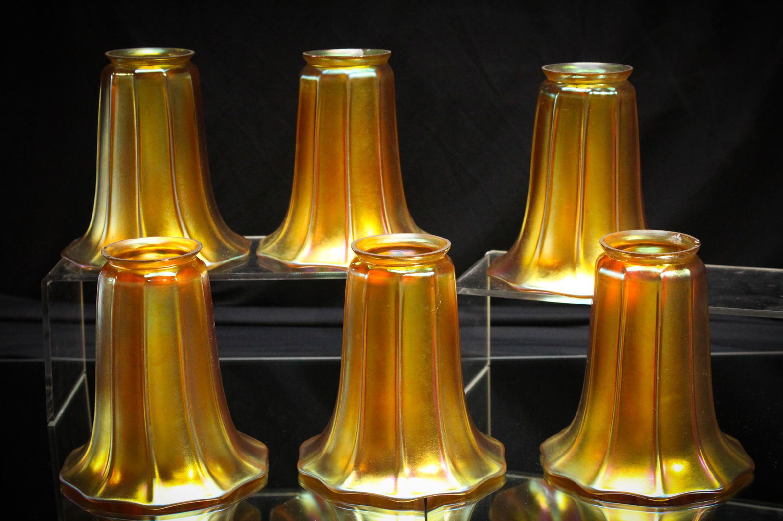 Lot 6 Signed Steuben Gold Aurene Glass Antique Shades: The best matched set of 6 signed Steuben gold aurene glass shades. These are absolutely amazing. Vibrant color inside and out. Shades measure 5 1/4" tall and have a fitter rim of 2 1/4" in diameter.