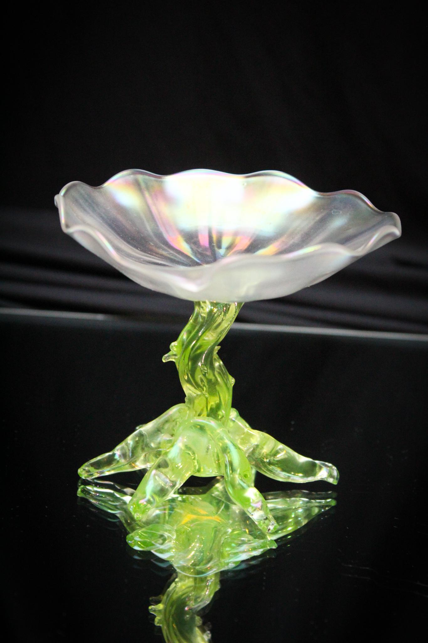 Vaseline Victorian Twig Form Pedestal Tazza: John Walsh Walsh Victorian Vaseline figural twig form stem and foot with a top of the iridescent glass in free form shape. Victorian all the way on this honey. Measures 4" tall.