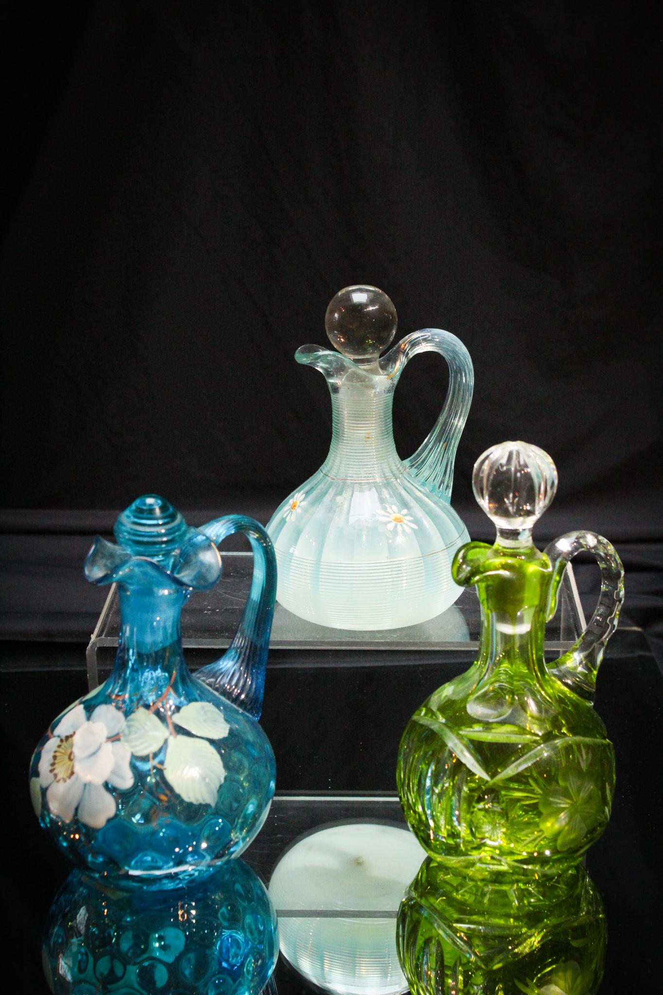 3 pc Lot Victorian Enameled Opalescent Cut Glass: Here we have a lot of bang for your buck folks. And we need it more than ever with rising prices. A lot of 3 cruets. One enameled, one Northwood opalescent, and one bohemian green cut to clear. Quite