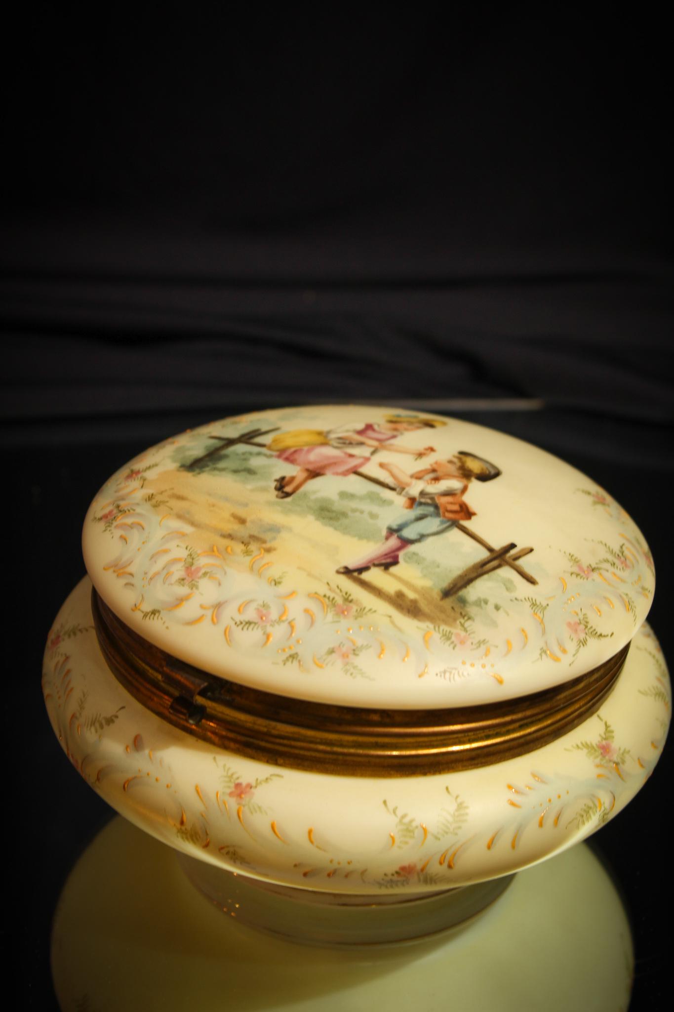 Wavecrest Era Belleware Victorian Courting children: The decoration on this box is entirely hand painted. Simple box attributed to Bellware decorated with a charming courting pair of juveniles and florals. It is so well done. It desrerves a special plac