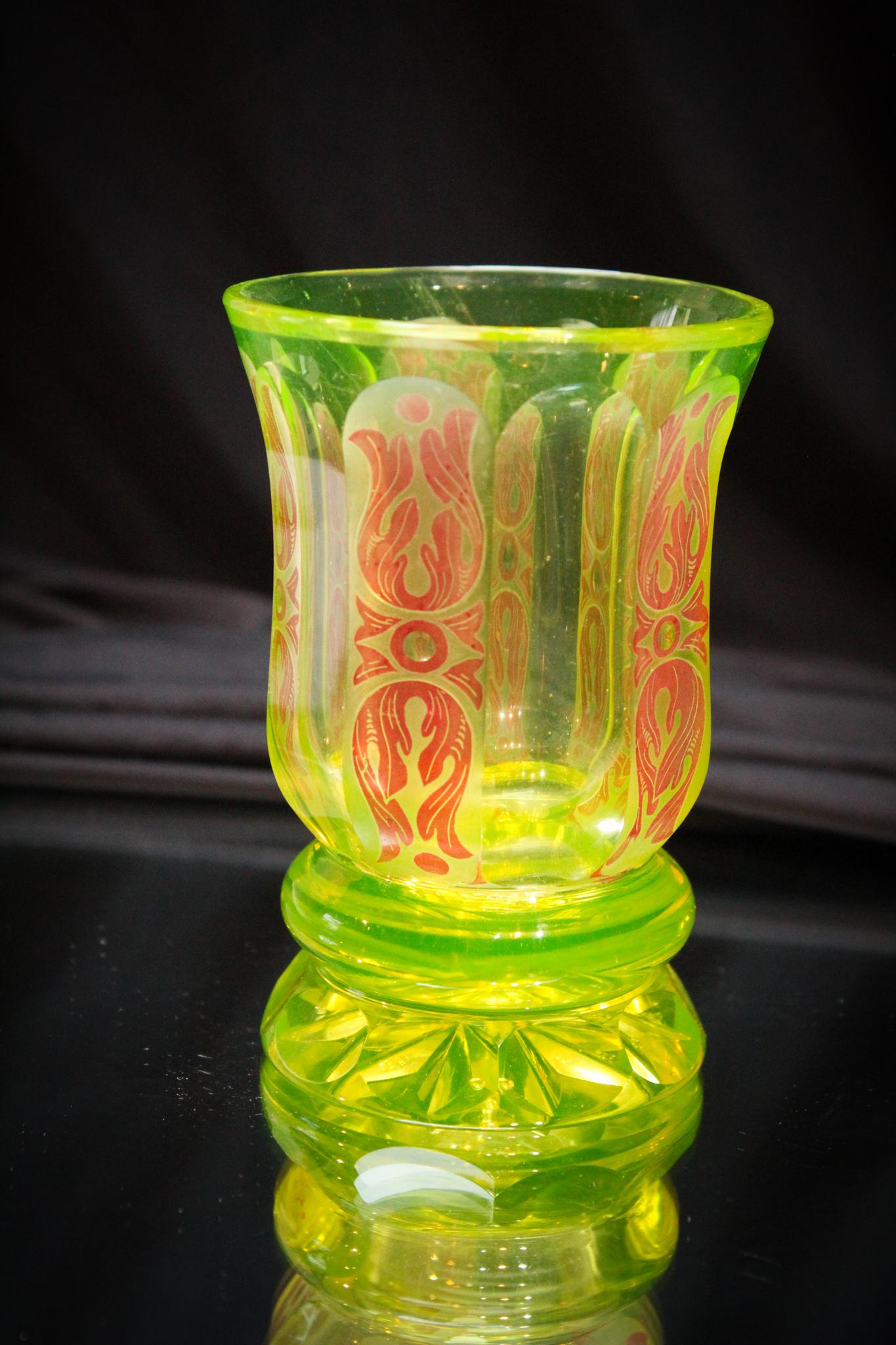 Bohemian Vaseline Cut Enameled Beaker: Well isn't this special? Attributed to one of the Bohemian glass houses, this charming beaker measures 5" tall. It has panels frosted and enameled as shown. Brilliant vaseline uranium glass.