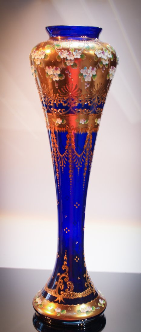 Bohemian 20" Moser Glass Gilt Enameled Decor vase: Massive 20" tall attributed to Moser or another Bohemian glass house gilt and raised enameled dÃ©cor vase. Incredible eye catching piece. The deepest cobalt base glass.