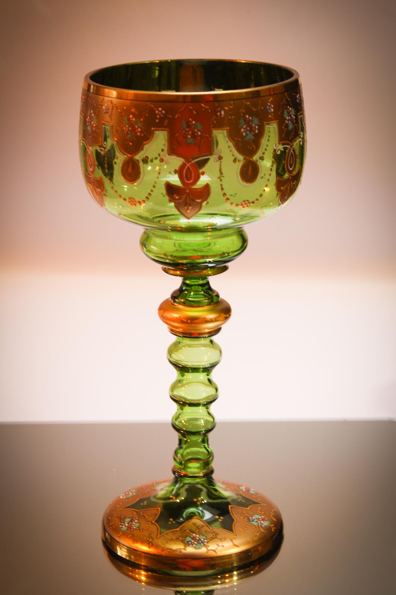 Bohemian Moser Chalice Gilt Enameled Decor: Boy you could have a fun night drinking from this one. Large, 10 3/4" tall Bohemian Moser type Chalice totally encrusted in gold and enameling. Great piece.