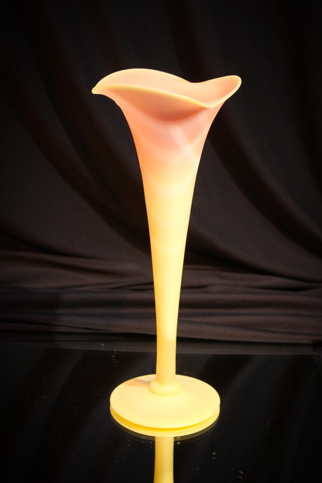 Mt. Washington Burmese Glass 10" Lily Vase: A classic form for Mt. Washington. We are proudd to say this has perfect burmese coloring when they fired this example. Nice shading. Lily vase measures 10" tall.