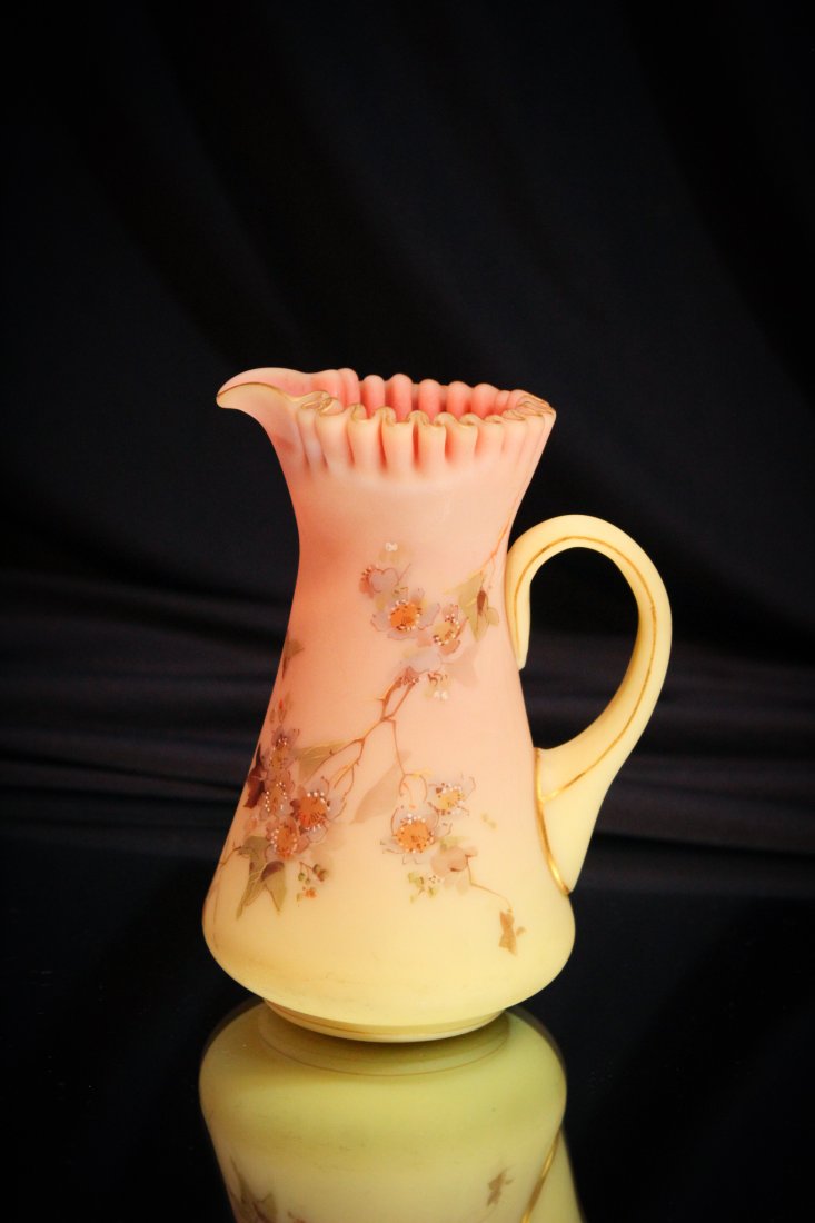 Mt. Washington Burmese Decorated Cream Pitcher: Isn't decorated burmese glass pretty? When Mt. Washington decorators added their special touch, it made a great piece of finely made glass even better. This is no exception. Hawthorne flowers decorate