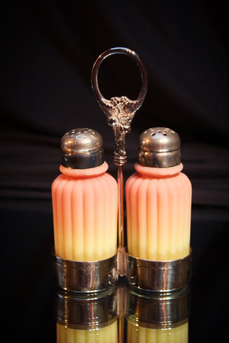Mt. Washington Burmese & Silverplate Shaker pair: Always a good find and perfect if youâ€™re a Mt. Washington, shaker, or general glass collector. Matched pair of Burmese ribbed pillar mold shakers in original silverplate holder. Scarcely this n
