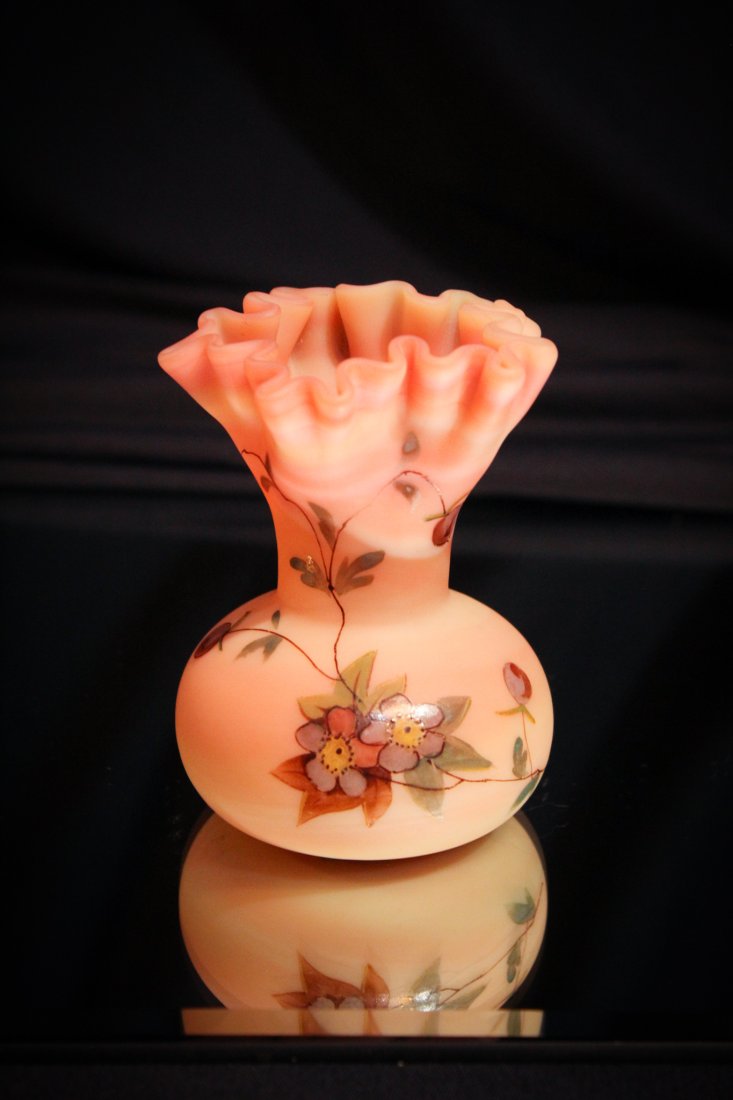 Webb Burmese Glass Cabinet Vase: Another cutie by Webb in their famous burmese glass. This one has nice floral decoration and form. Measures 3 3/4" tall.