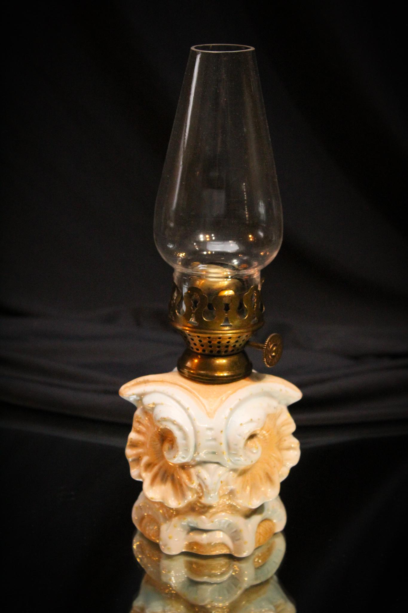Victorian Bisque Miniature Owl Oil lamp: Owls are so darn cute and this little guy is no exception. Bright big eyes and great details. It measures 9 3/4" tall to the top oof the chimney. Cute.