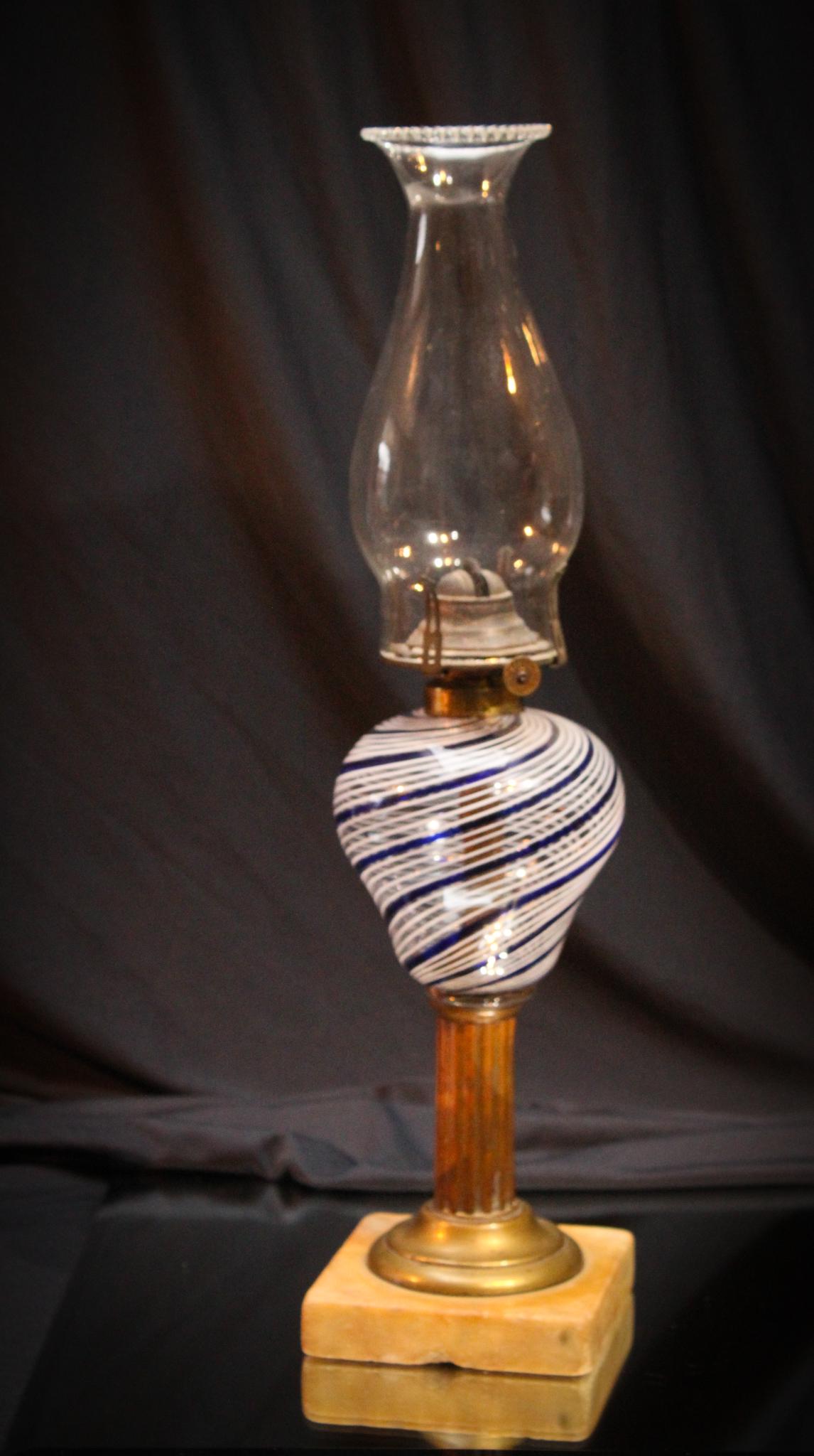 Boston Sandwich Latticino Free Blown Oil Lamp: What a beautiful and rare lamp. A Boston Sandwich latticino Free Blown Oil Lamp. Very nice piece with the best coloring and condition. Measures 9" tall the top of the burner collar and 17" to the top 