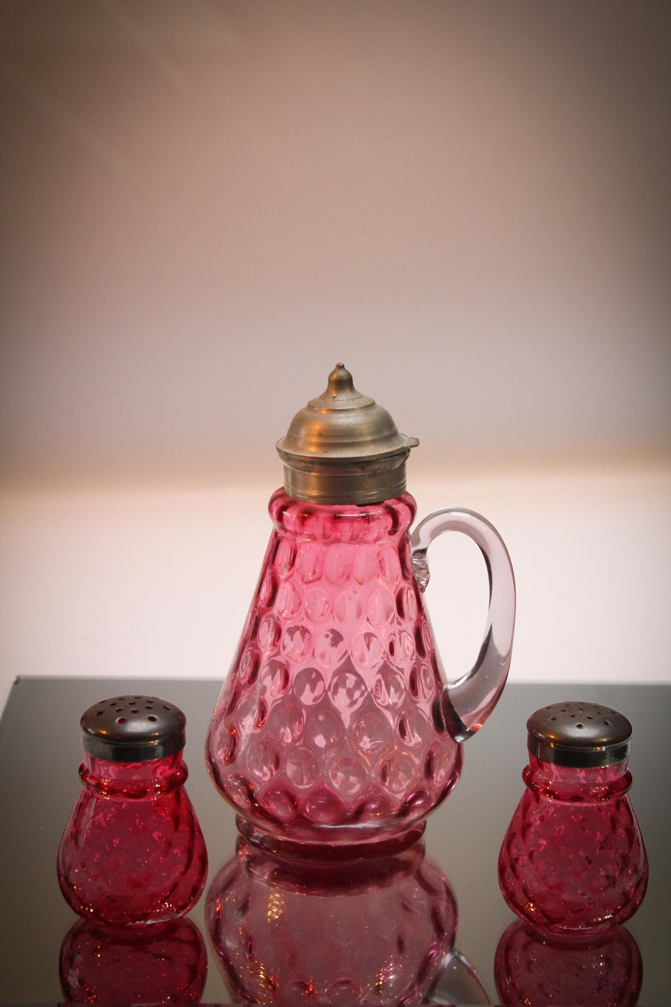 3 pc Lot Hobb's Cranberry Victorian Glass: Hobb's made some beautiful glass. Here we have a cranberry inverted thumbprint syrup and a pair of Venetian diamond salts. Great color on each! Tallest measures 7 1/2" tall.