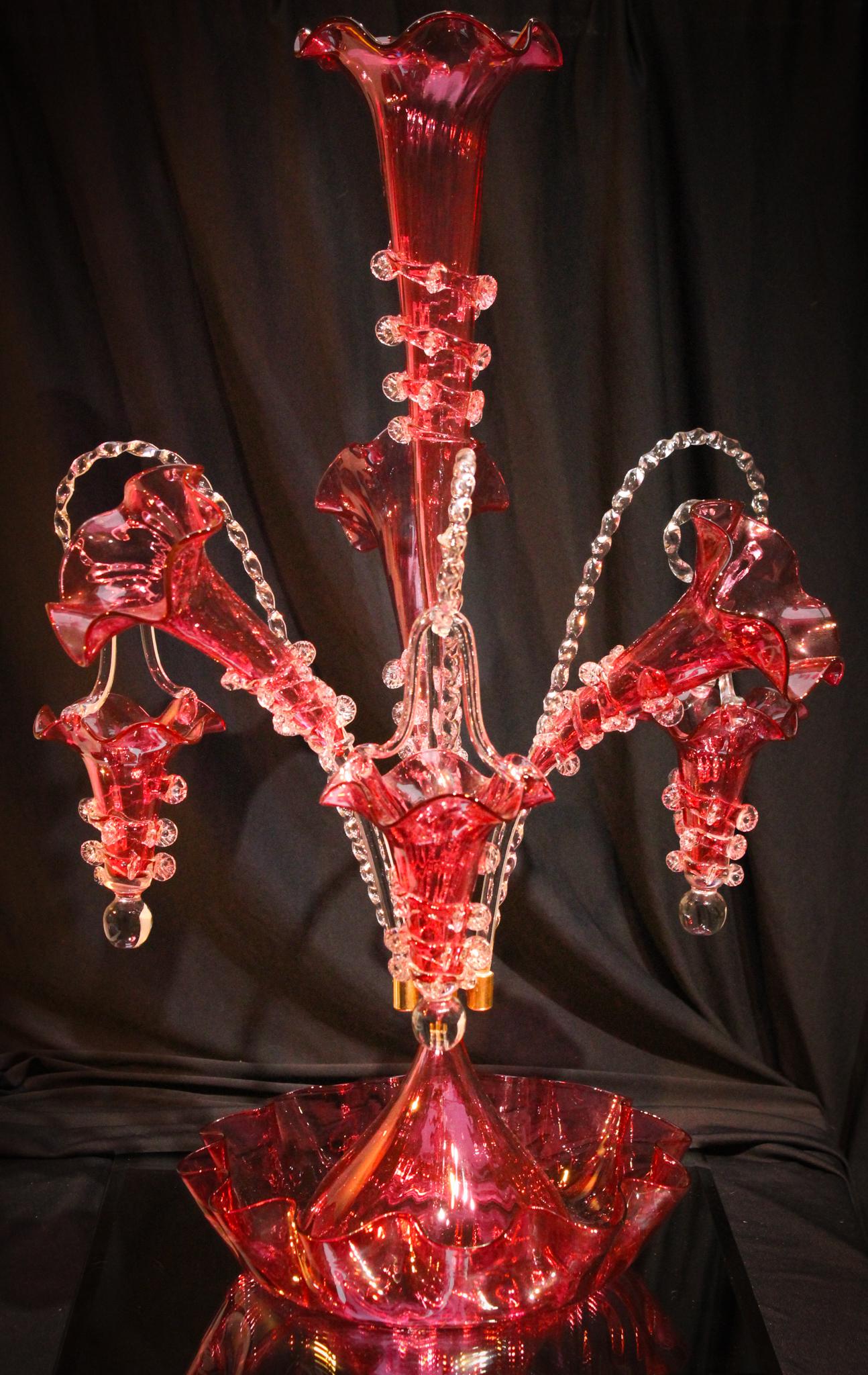 Cranberry 23" Art Glass Huge Epergne: Now this is showy. Who can say they don't like cranberry glass when you see something as impressive as this? Imagine this gracing your dining table. This epergne Has 4 horns, 3 canes, and 3 baskets. O