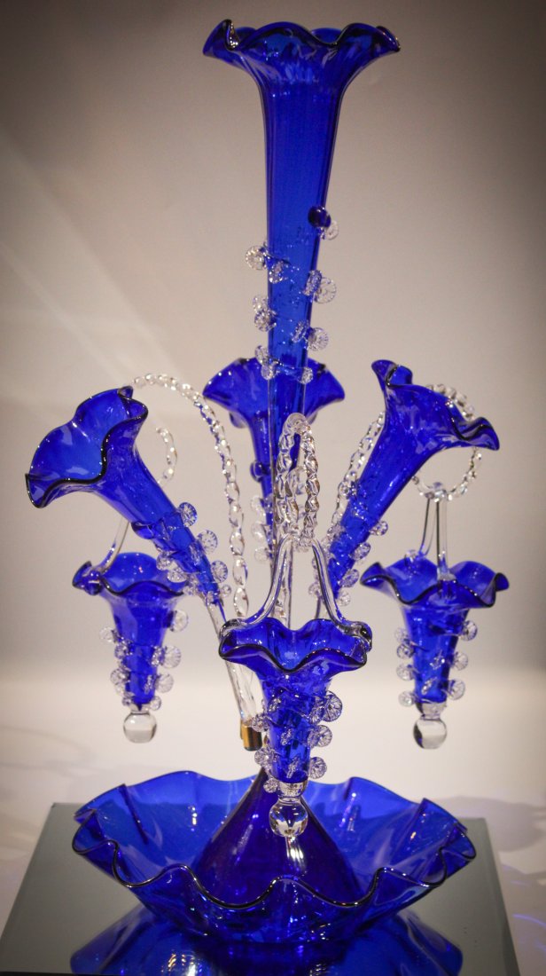 Cobalt 23" Art Glass Huge Epergne: How about this one folks? The deepest of cobalt blue and crystal clear make up this lovely. Comprised of 4 horns, 3 canes, and 3 baskets this piece is exceptional. If this doesn't say Victorian style,