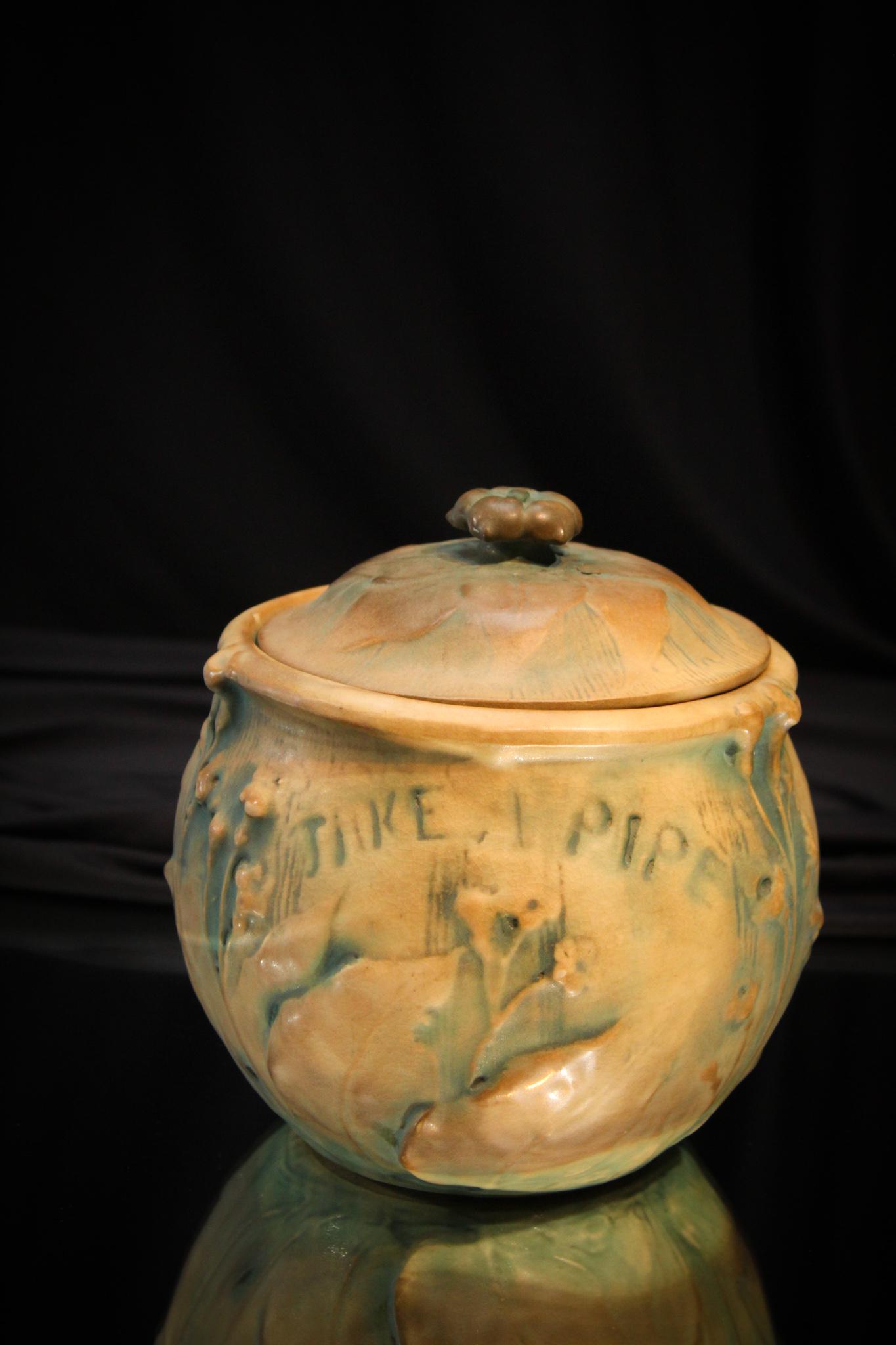 Amphora " Take a Pipe" Leaves & Flowers Humidor: Put this in your pipe and smoke it! Perfect unusual form Amphora Humidor with embossed leaves and flowers. Your tobacco will work perfectly in this along with the winning lottery tickets you want to h