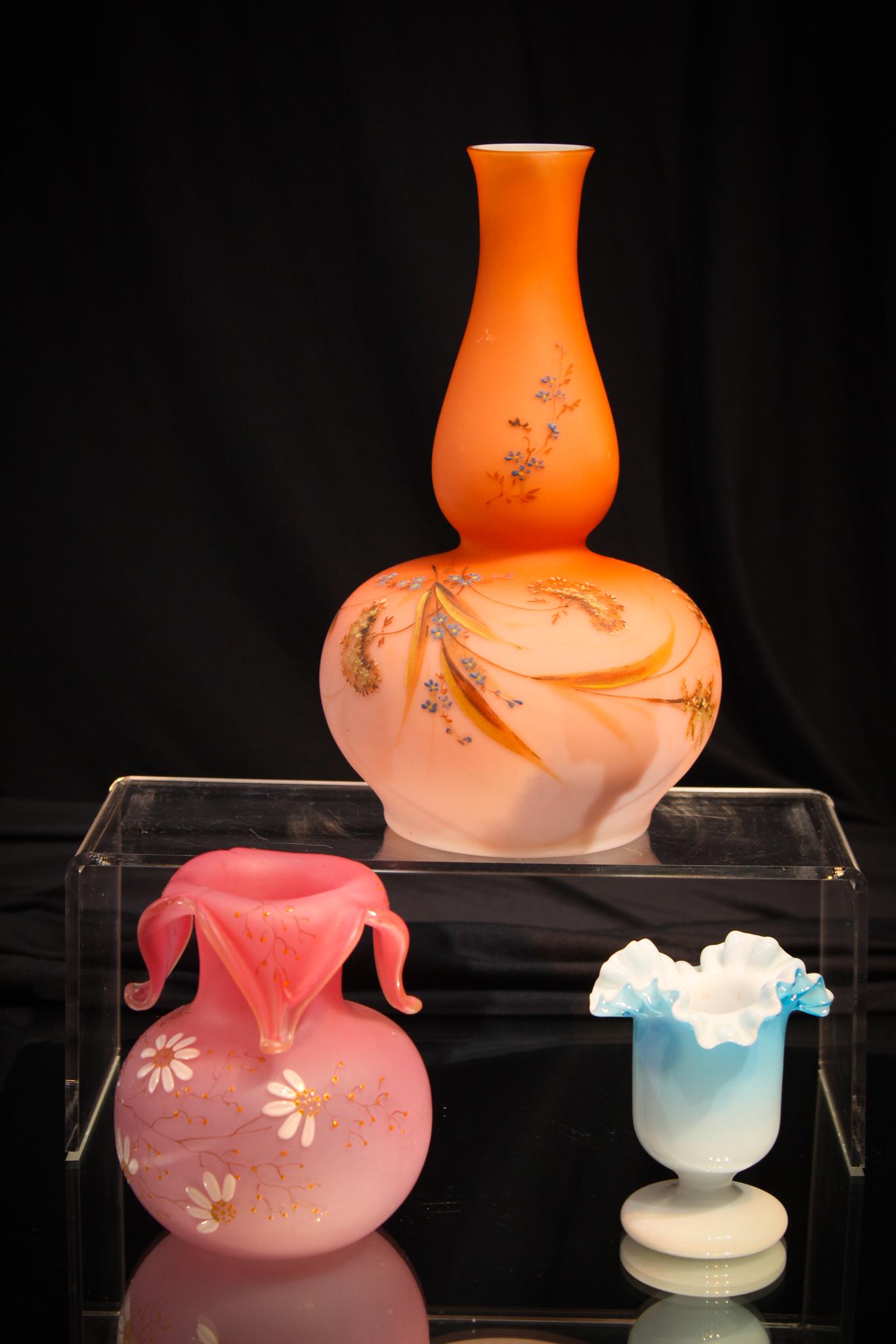 3 pc Lot Victorian Art Glass Toothpick & Vases: Victoriana at it's best. Victorian's sure loved their glass didn't they? Charming blue cased pedestal toothpick holder and two decorated vases. All together. Tallest measures 9" tall.