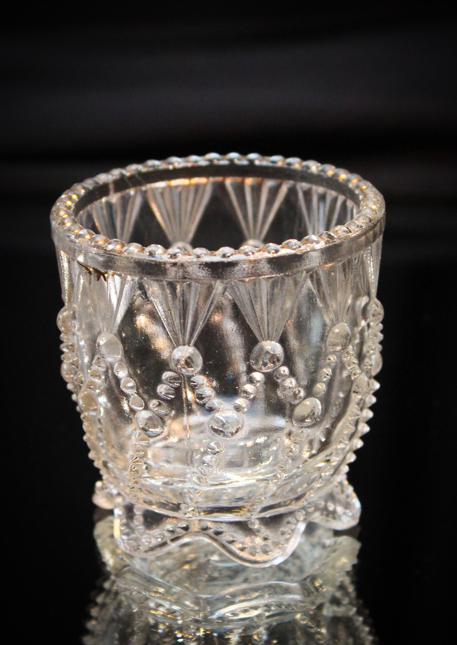 Greentown Cord Drapery Victorian Toothpick Holder: This is always a favorite pattern in any coloring. Cord Drapery toothpick in clear. Tough tough to find. Measures 2 1/2" tall.