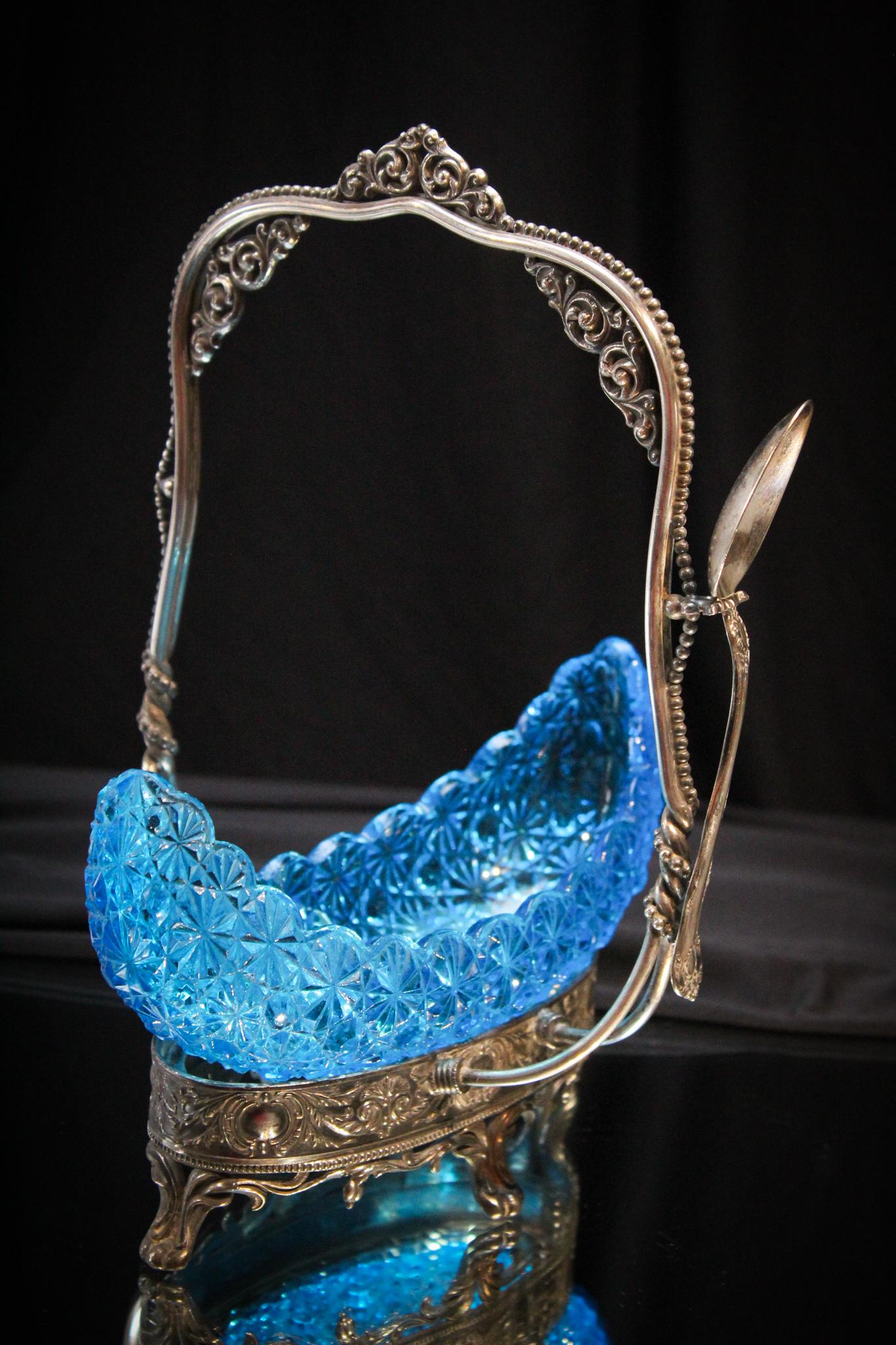 Victorian Blue Daisy Button Silverplate Olive Castor: Such a beautiful piece. We love blue and are sure you do as well. This figural daisy & button pattern glass canoe is set in a Victorian silverplate ornate frame. These olive castors are seldom seen an