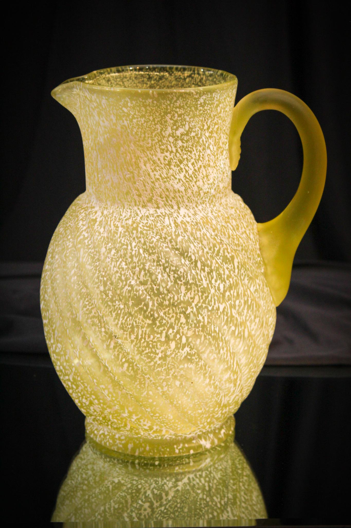 Reverse Swirl Vaseline Frit Water Pitcher: The vaseline on this pitcher is much more yellow than the typical you find in the jar you use for moistening up your dry winter skin. This actually glows under black light as well. Be glad the stuff i