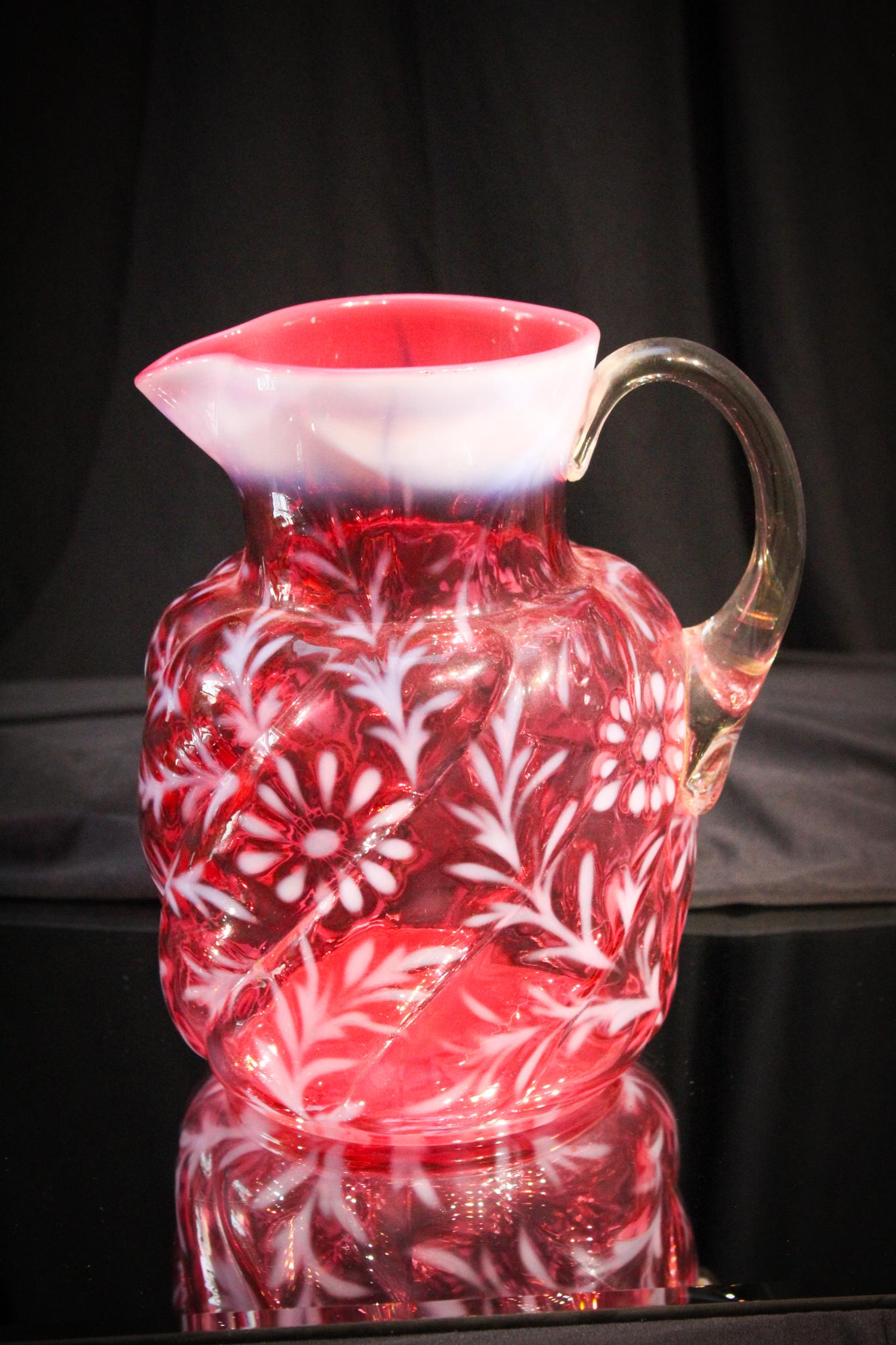 Cranberry Opalescent Daisy Fern Pitcher (READ): A hard to find water pitcher and do you know what is even harder to find? A perfect one. This isn't. Yep cracked as shown. Still displays well. Measures 8" tall.