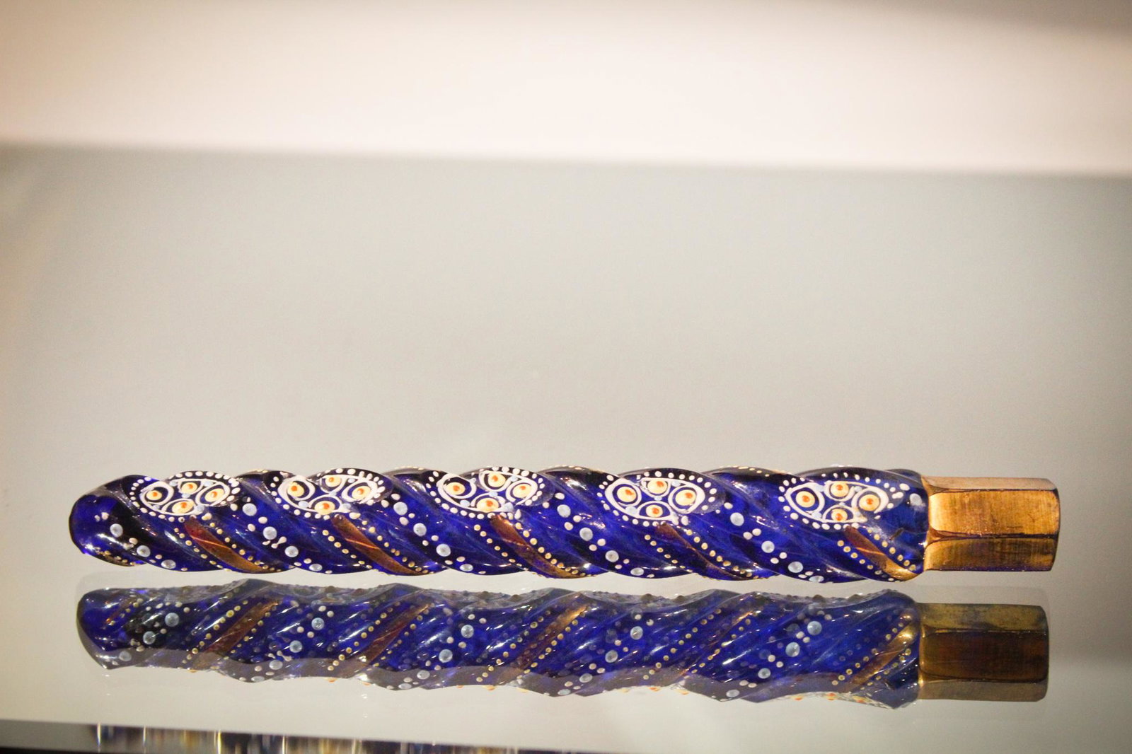 Cobalt Enameled Laydown Perfume Flask: The color on the perfume flask is intense. It is highly enameled and decorated with gold as well. Measures 6 1/4" long.