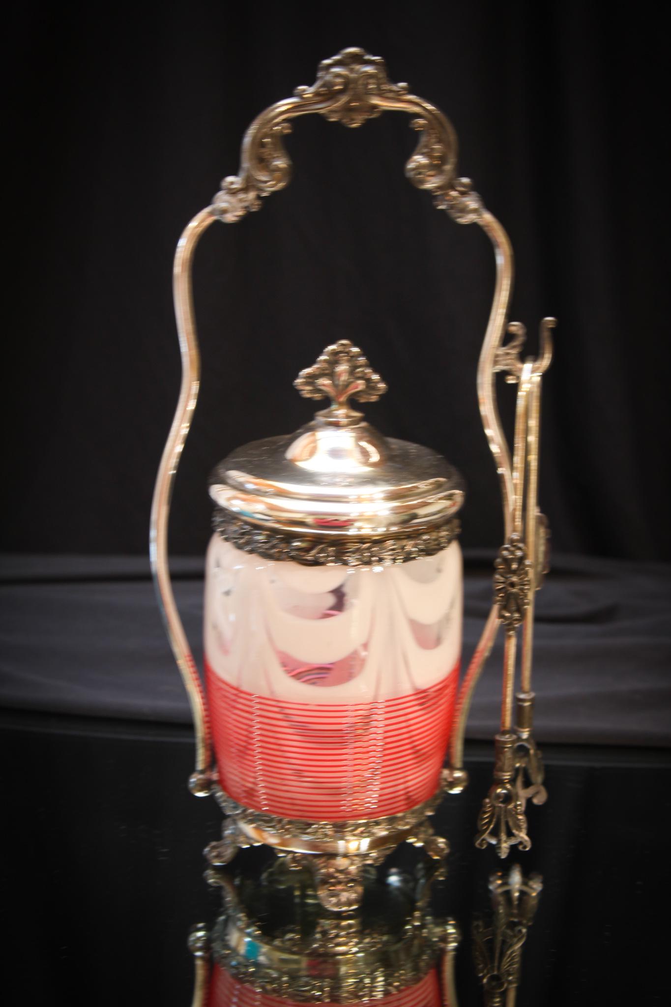 Rare Hobb's Cranberry Venetian Pickle Castor: Another toughie. A Hobb's Cranberry threaded Venetian pattern pcikle castor. Silverplate holder is signed Simpson Hall Miller. Measures 11" tall.