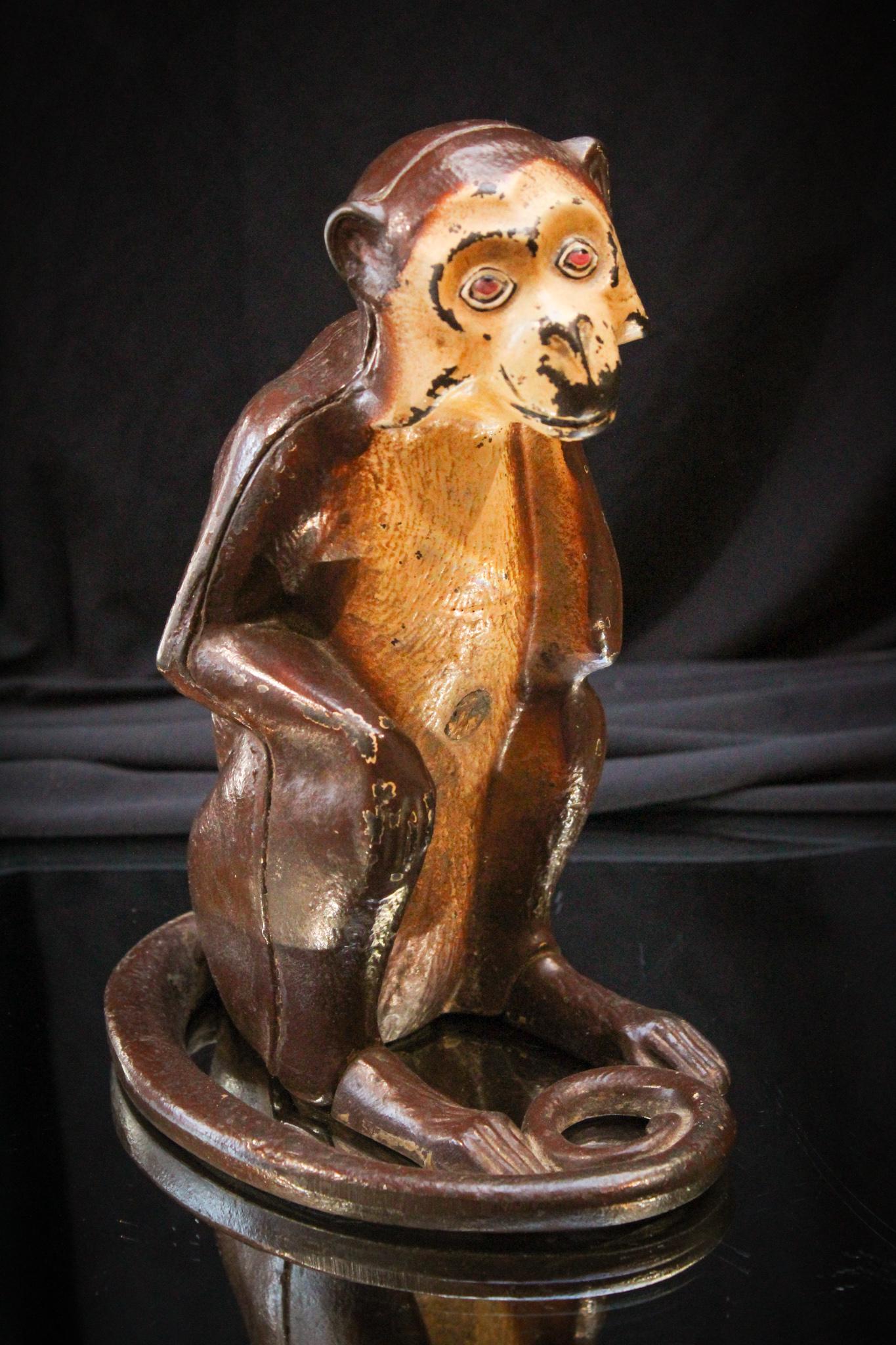 Hubley Cast Iron Monkey Doorstop: Everyone needs a monkey doorstop don't they? Well maybe not everyone but how could you pass on this little furry guy? Quite heavy made of cast iron. Measures8" tall.