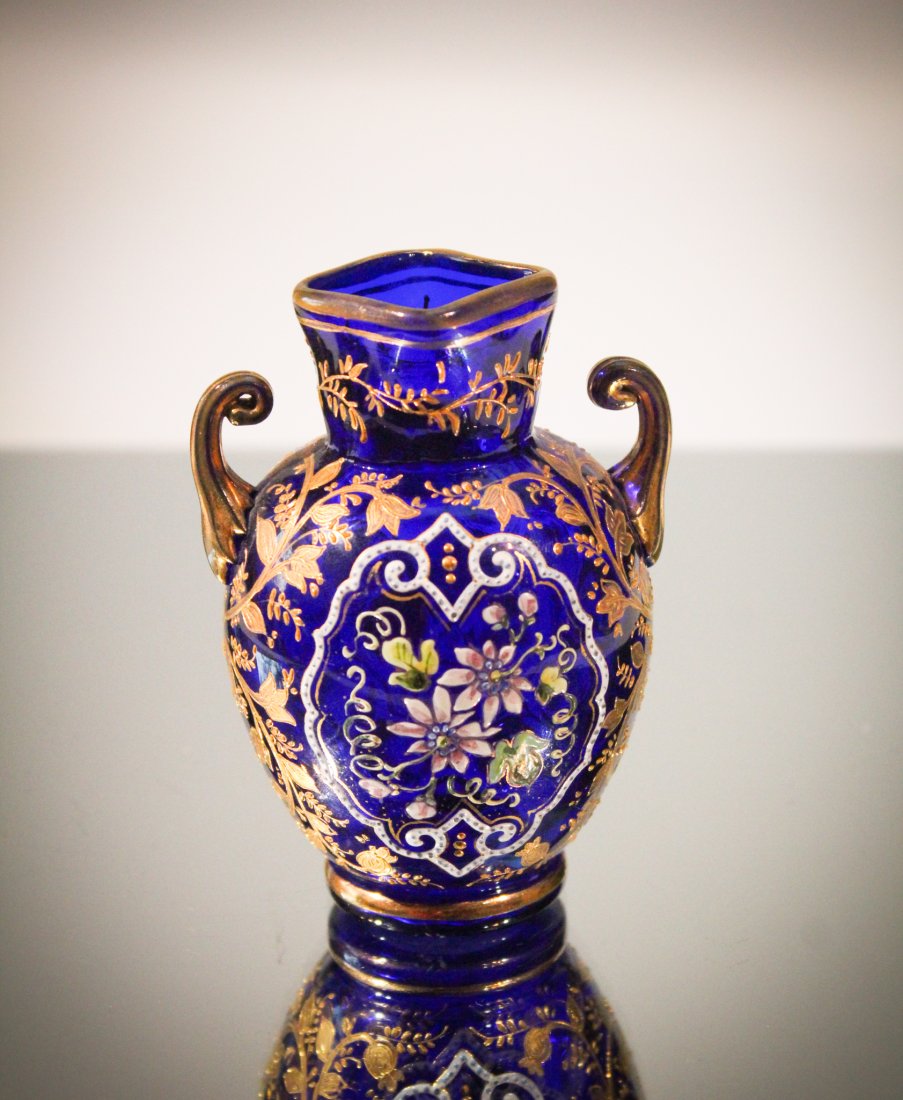 Tiny 3" Cobalt Moser Handled Enameled Vase: Exceptional Moser 3 1/2" tall Cabinet vase in cobalt blue with the best enamel dÃ©cor and gilt embellishments. If you can't find a place for this honey, you have a serious collecting problem. Look a