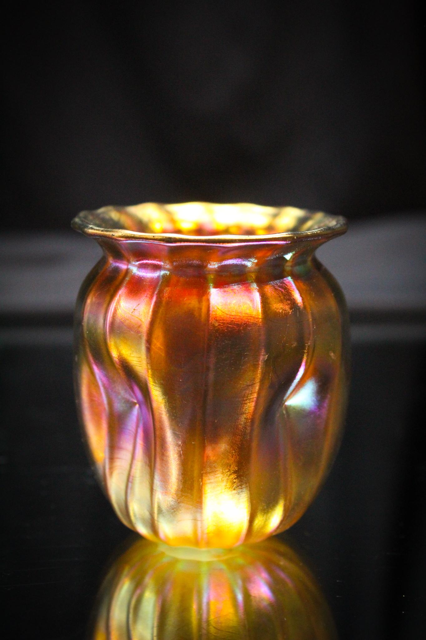 Signed Vivid Quezal Toothpick Holder: Take a moment to look at the outrageous color of this gem. Can't believe it? We can't either. Just the best! You need this toothpick for your collection. Measures 2 1/2" tall.