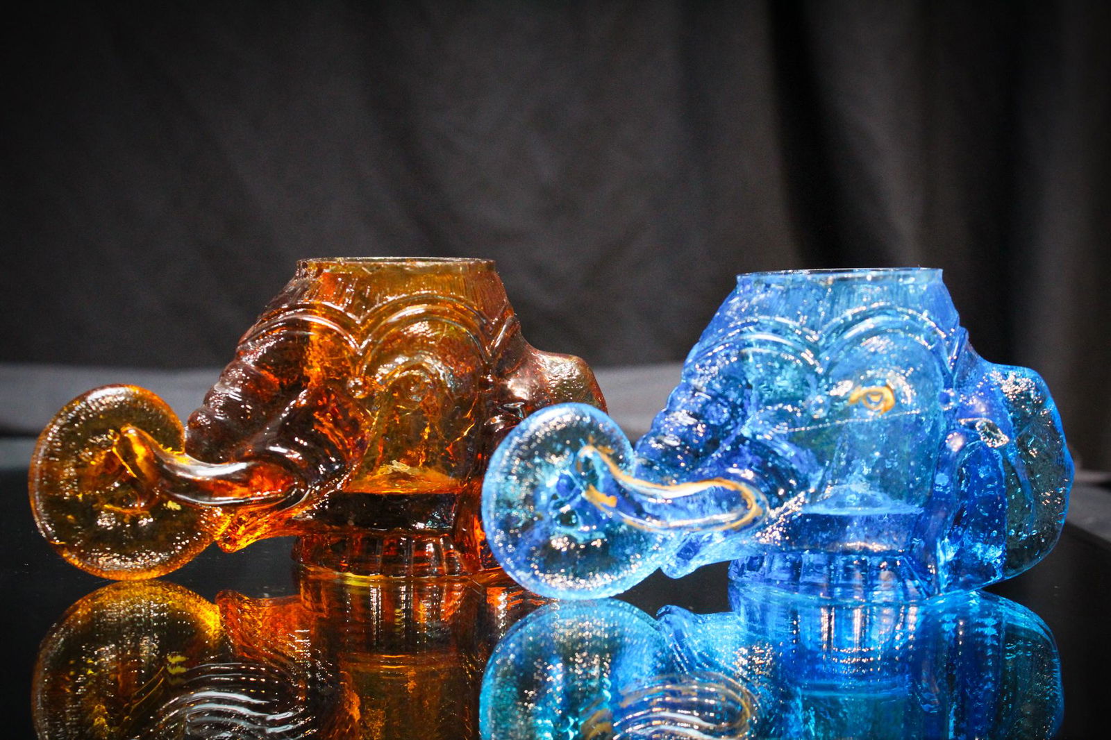 2 pc Lot Elephant Head Victorian Toothpick Holders: Raise your trunks in the air for these pacaderms! One blue and one amber elephant head figural Viictorian toothpicks.