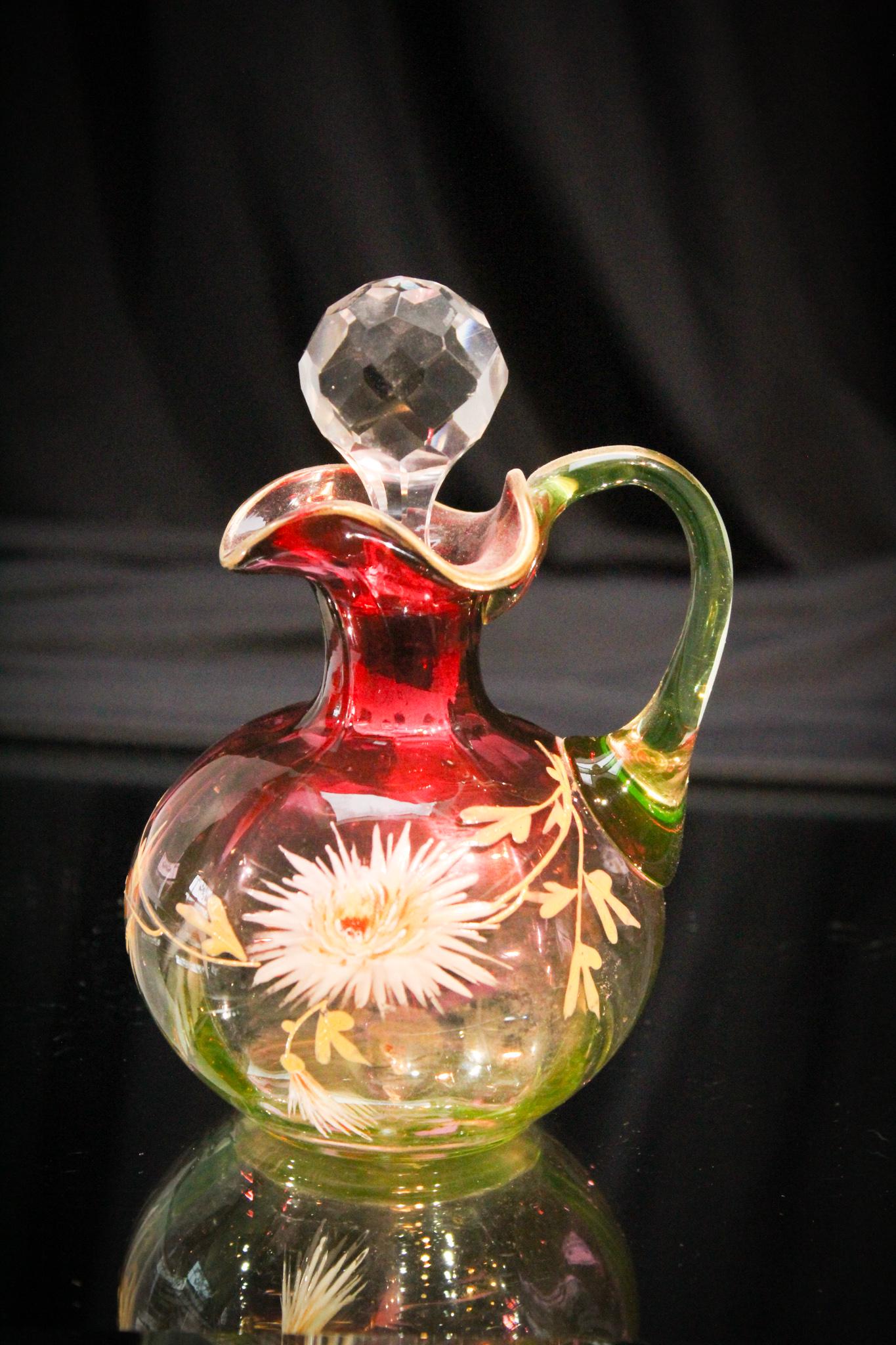 Cranberry Vaseline Enameled Victorian Glass Cruet: Folks this cruet is very nice. Enameled cranberry to vaseline with clear faceted stopper. Measures 5 1/2" tall.