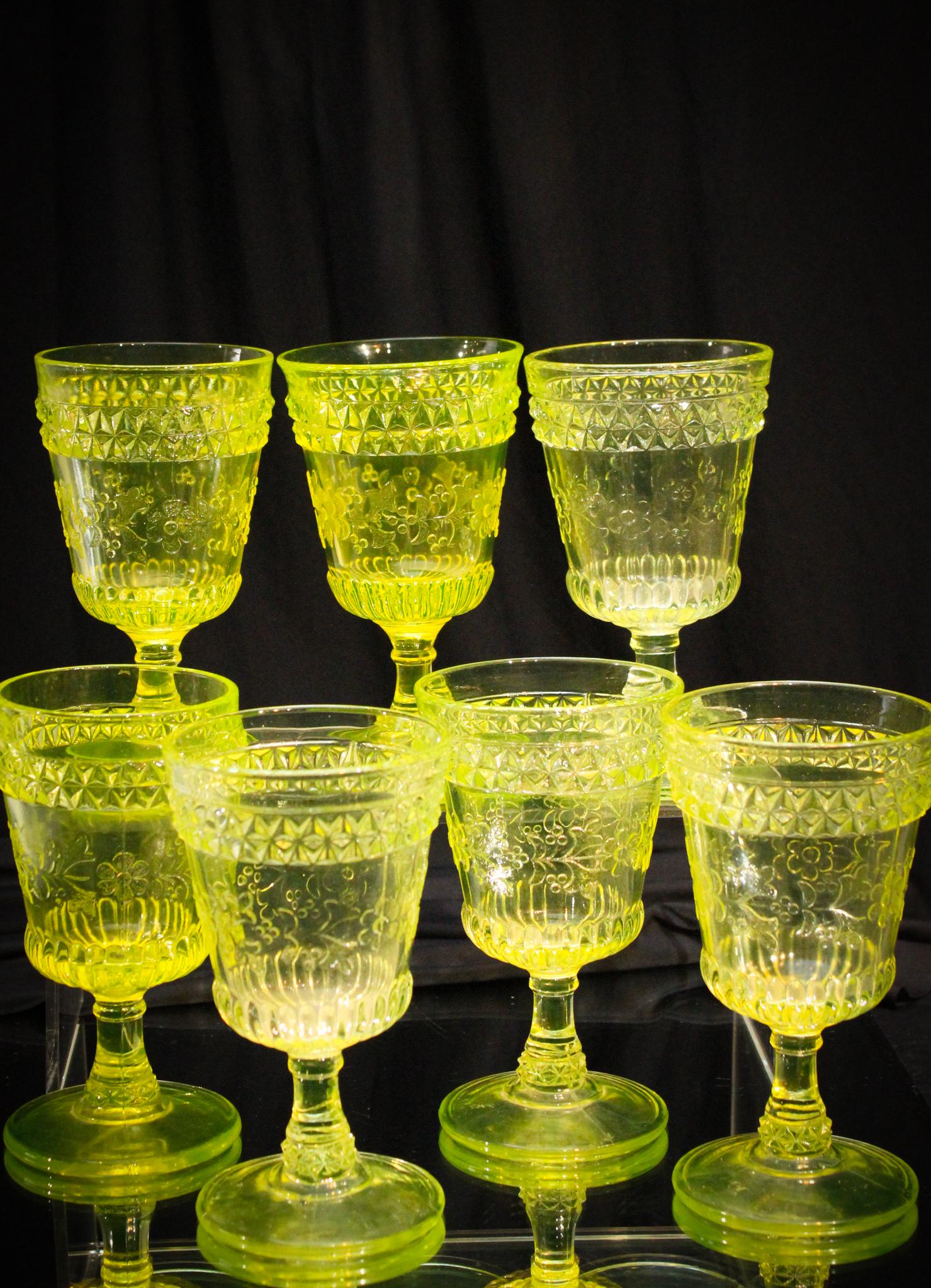7 pc Lot Vaseline Wildflower pattern Goblets: Nice 7 piece lot of Victorian (4) and later(3) Wildflower pattern vaseline goblets. Tallest measures 4 3/4" tall.