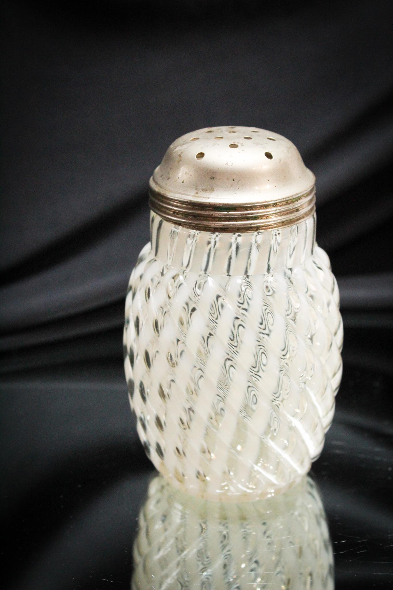 Reverse Swirl Victorian Opalescent Sugar Shaker: Ever consider a sugar shaker for the powdered sugar needs in your life? We have. From Muffins to steaks to eggs to cakes, what would powdered sugar be without a shaker to shake it from. Now, we know y